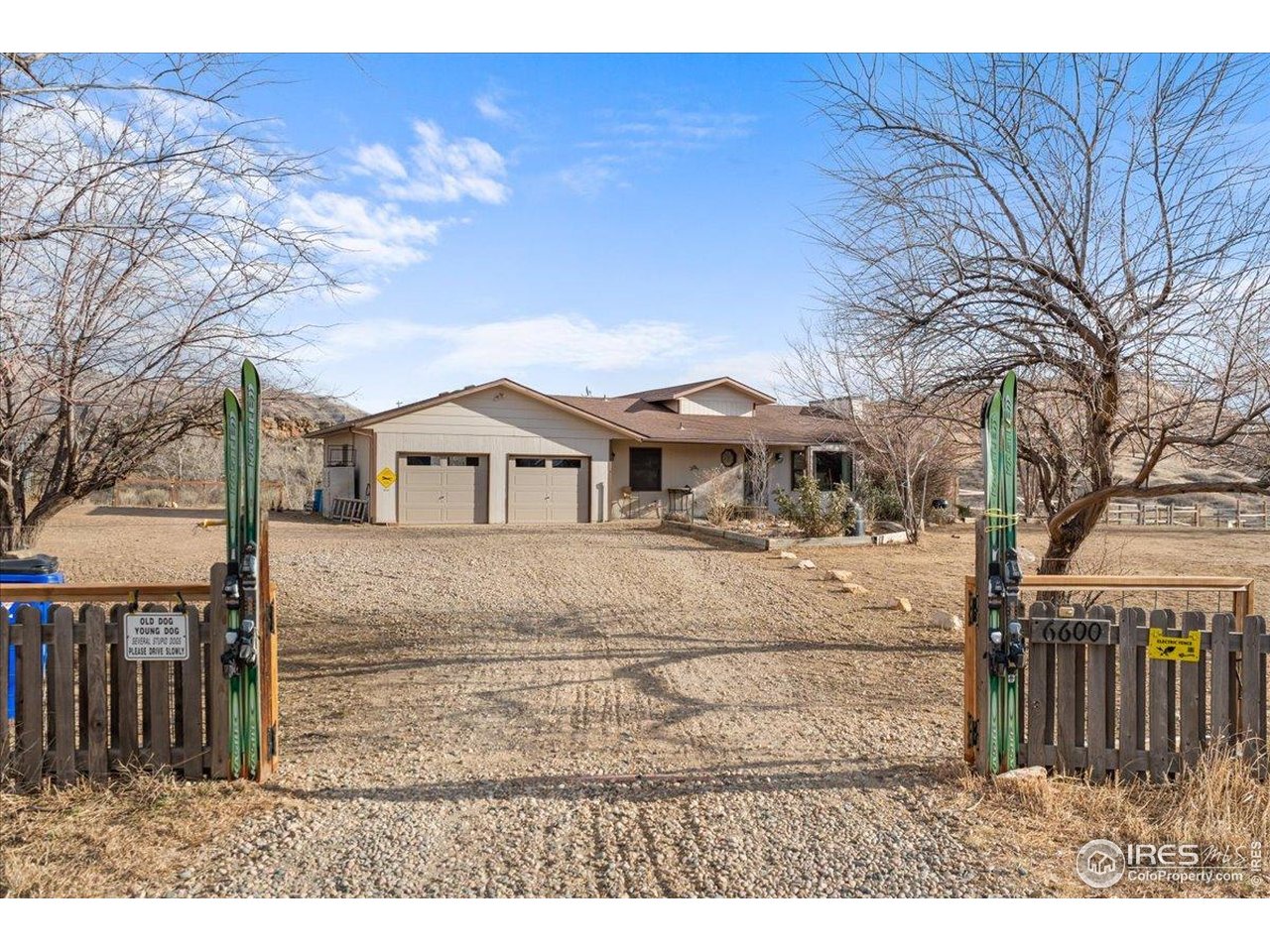 Mountain Sanctuary! This hidden gem horse property is a rare find! A foothills sanctuary where breathtaking views and modern daily living converge-minutes from Loveland and Ft Collins. Outside city limits at the end of a quiet cul-de-sac in Masonville; the road is paved from town to the driveway. A humble yet elegant walk-out ranch style property sits on 6+ acres of pastures and natural areas, with a fenced turnout pasture, loafing shed and a 750 sq ft barn with indoor/outdoor dog runs and a loft. Surrounded by vast undeveloped acreage it offers true Colorado living to accommodate horses, dogs, cats and chickens; in harmony with untouched wildlands! A seasonal waterfall & creek run through it! The thoughtfully designed 4 bedroom, 3 bath residence features 3,034 finished sq ft. A remodeled open floor plan features a great room connected to a passive solar sunroom, with vaulted ceilings & expansive windows that frame mountain peaks & valley views bringing the outdoors in from every vantage point. This property also features an in-home office & an attached over-sized garage. It is perfectly suited for practical everyday living, in-home business & spacious "wow you" entertaining. Surrounded by natural beauty, it is just minutes to Coyote Ridge, Devils Backbone and Horsetooth and Carter lakes, offering endless possibilities for equestrian & recreation, or just relaxing on the deck to enjoy the peace & quiet of wide-open space. Part of a small, coveted community, the HOA (only $45/year) includes ownership/access to an expansive 72 acre private greenbelt system on the Buckhorn and Redstone confluence, ensuring a true sense of nature and wildlife preservation. This remote and rugged space is supported by the conveniences of modern living: Little Thompson water district and Poudre Rural Electric Assn, flawless Wifi service (RiseBroadband), as well as furnace/fireplace/woodstove fueled by propane & a well-maintained septic system. This is more than a home-it's a lifestyle!