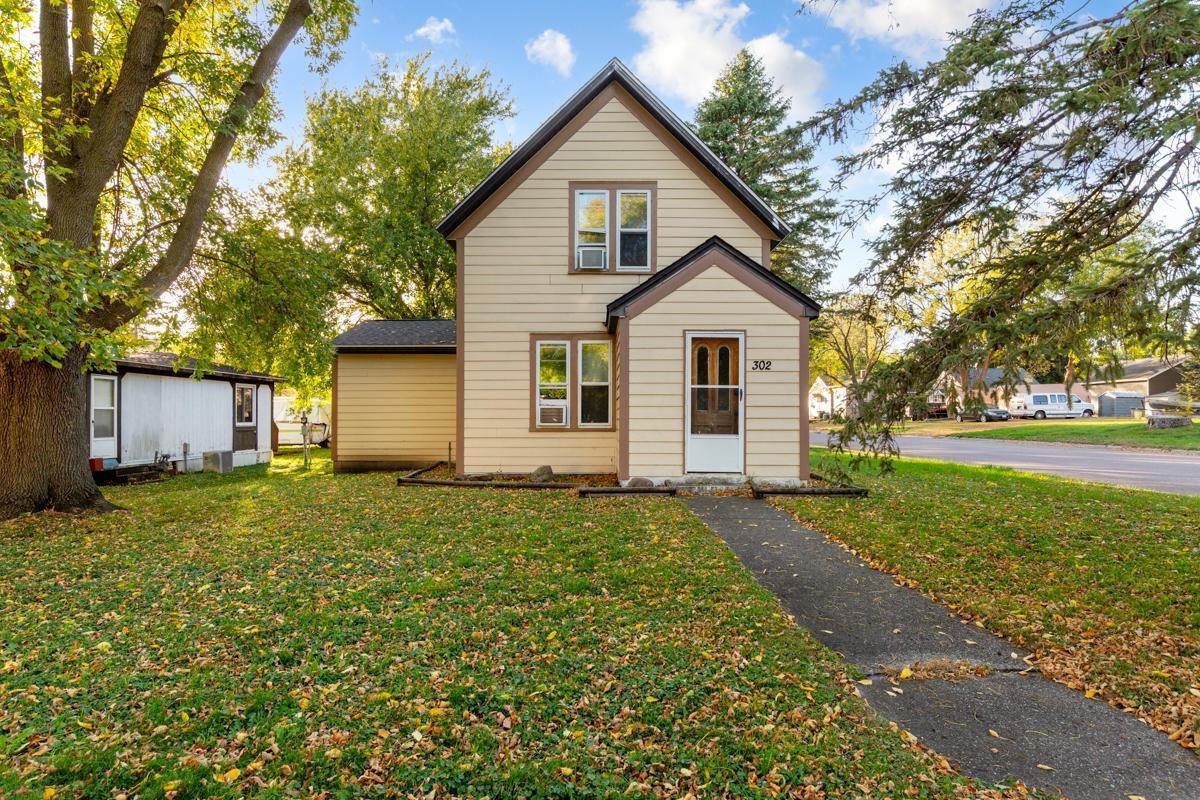 Welcome to this cozy 1 1/2 story home. This 3 bedroom, 2 bath home has charm and warmth. The deck welcomes you into the kitchen. Main floor laundry with newer washer and dryer in 2024. Main level primary bedroom, living room and informal dining room. Upstairs you will find two more bedrooms and a full bathroom. New furnace and roof on both the house and the garage in 2025.