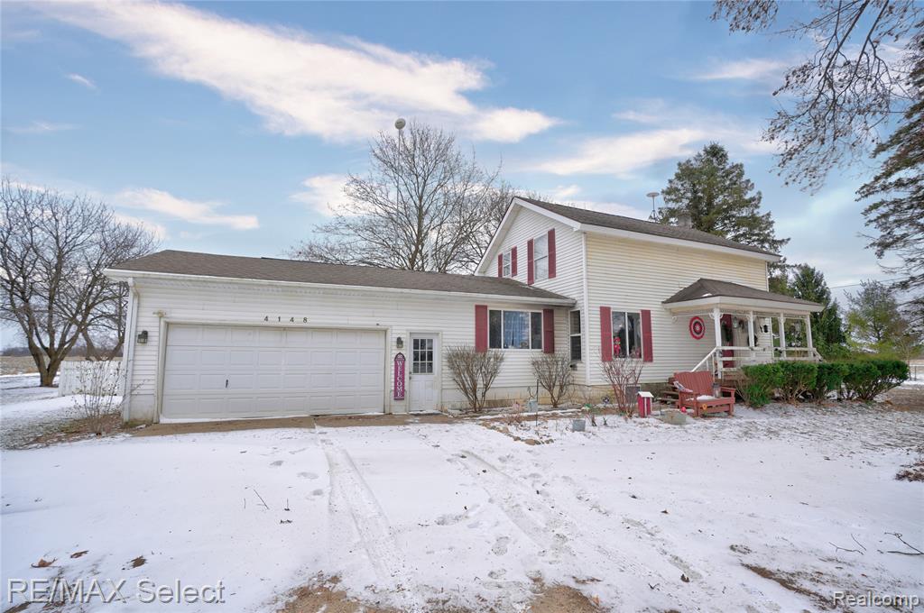 Welcome to 4148 N Williams Rd in St. Johns — a beautifully updated farmhouse set on just under 2 acres, surrounded by peaceful farmland and breathtaking open views. This 4-bedroom, 2-bath home blends classic country charm with modern updates throughout. Step inside to find new flooring, fresh paint, updated bathrooms, and updated plumbing, offering a move-in-ready interior while preserving the warmth of farmhouse living. Outside, you’ll love the adorable front porch, a partially fenced backyard, and abundant space to enjoy the outdoors. In addition to the attached garage, this property features a detached garage plus three additional outbuildings, providing endless options for storage, hobbies, animals, or workshop space. With room to play, build, and grow, this property offers unbelievable views and unlimited opportunities to create lasting memories in a serene country setting.
