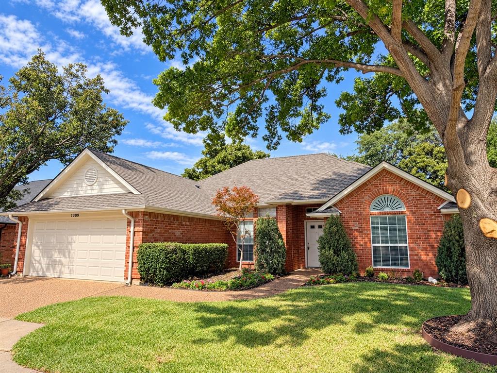 Welcome to 1309 Danielle, located very close to Generations Park! A Japanese maple accents the front entrance of this inviting three-bedroom home featuring 10-foot ceilings, vaulted accents, and no popcorn ceilings. The kitchen opens to the breakfast area and spacious living room, creating a comfortable layout for everyday living and entertaining. A propane fireplace adds warmth to the living room, while a separate dining room offers additional gathering space. The kitchen features an electric range and GE Profile stainless steel dishwasher. The separate utility room includes extra pantry storage, and the washer and dryer are available to stay. The generous primary suite features a vaulted ceiling, an 11-by-5-foot walk-in closet, separate shower and tub, single vanity, and private toilet area. Secondary bedrooms include a vaulted ceiling in one and a walk-in closet in the other. Additional features include 2-inch blinds, coat and linen closets, and a 20-by-19-foot garage. The backyard offers a covered patio for relaxing outdoors and a storage building for tools and outdoor essentials. Schedule your tour today!