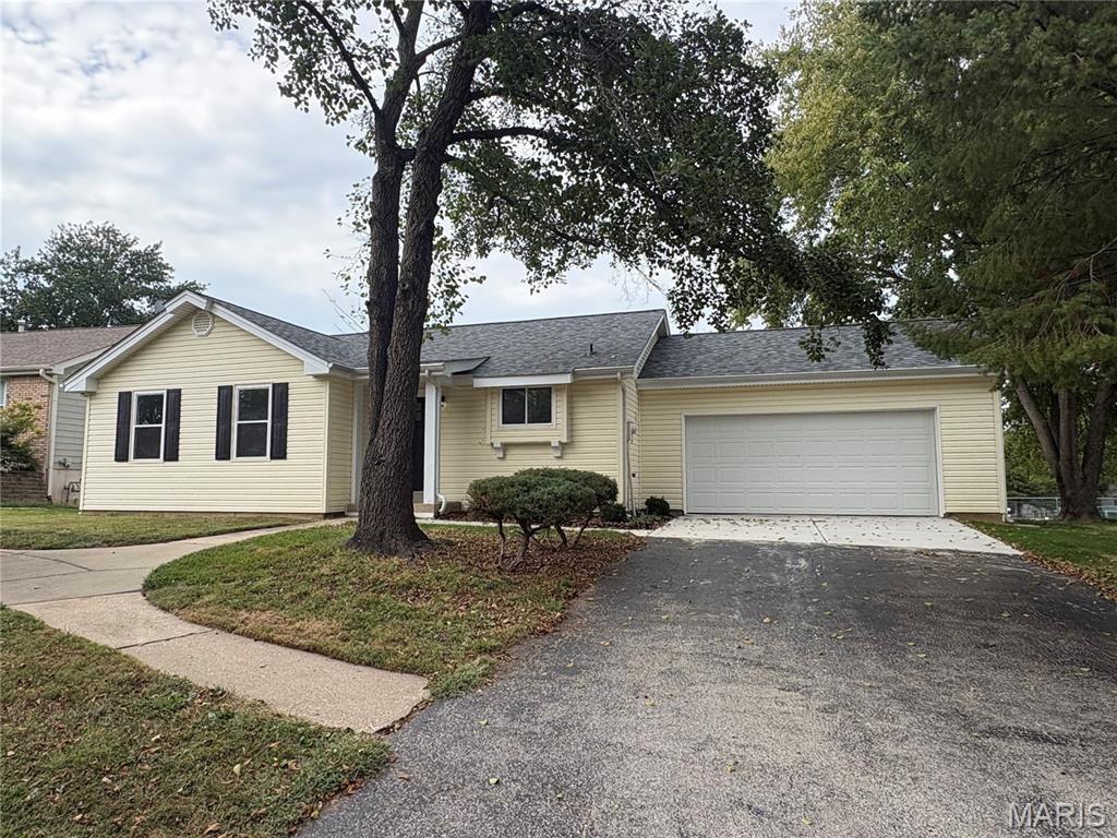 Updated ranch in the City of St Peters with 3 bedroom, 2 baths, 2 car garage and finished walkout basement. Updates include: New kitchen, with granite and stainless appliances, new baths with ceramic surround, new tub/shower base and vanity. New wood floors in living room,  kitchen, hall and hall bath. New carpet in the bedrooms. Fresh interior paint. New interior doors, baseboards and trim. New LVP in lower level. New roof. New exterior doors. New deck. New ceiling fans, light fixtures and electrical devices.  New concrete garage floor and part of driveway.