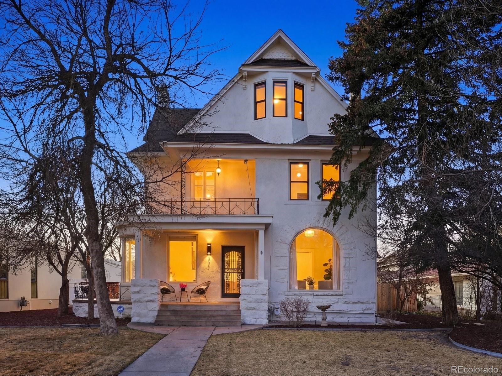 Tucked into one of Denver’s most sought-after neighborhoods, this one-of-a-kind home blends historic character with thoughtful modern updates. Once the farmhouse of a former apple orchard, it carries a unique story while offering the comfort and functionality of contemporary living.Recent improvements include refinished hardwood floors, updated electrical, new lighting and fixtures, and a full interior repaint. The breakfast nook now features brand-new glass doors that open to a stunning backyard retreat with a newly built deck and custom outdoor kitchen with both gas and wood-burning ovens—perfect for entertaining. Newly planted trees and landscaping enhance privacy and create a peaceful outdoor escape.Inside, the home has an unmistakable personality—bright, stylish, and full of character. A refined, eclectic aesthetic with bold touches of color gives the space a sophisticated yet playful energy.The home offers five bedrooms and three bathrooms across a functional, inviting layout. The main level features welcoming living and dining spaces that flow seamlessly together, centered around a beautifully updated kitchen designed for cooking, gathering, and entertaining.Upstairs, four bedrooms sit on one level, offering flexibility for guests, offices, or growing households, while the top floor is dedicated to a private primary retreat.Large windows fill the home with natural light, creating a strong connection to the outdoors. With its rich history, vibrant style, and exceptional indoor-outdoor living, this home truly stands out.