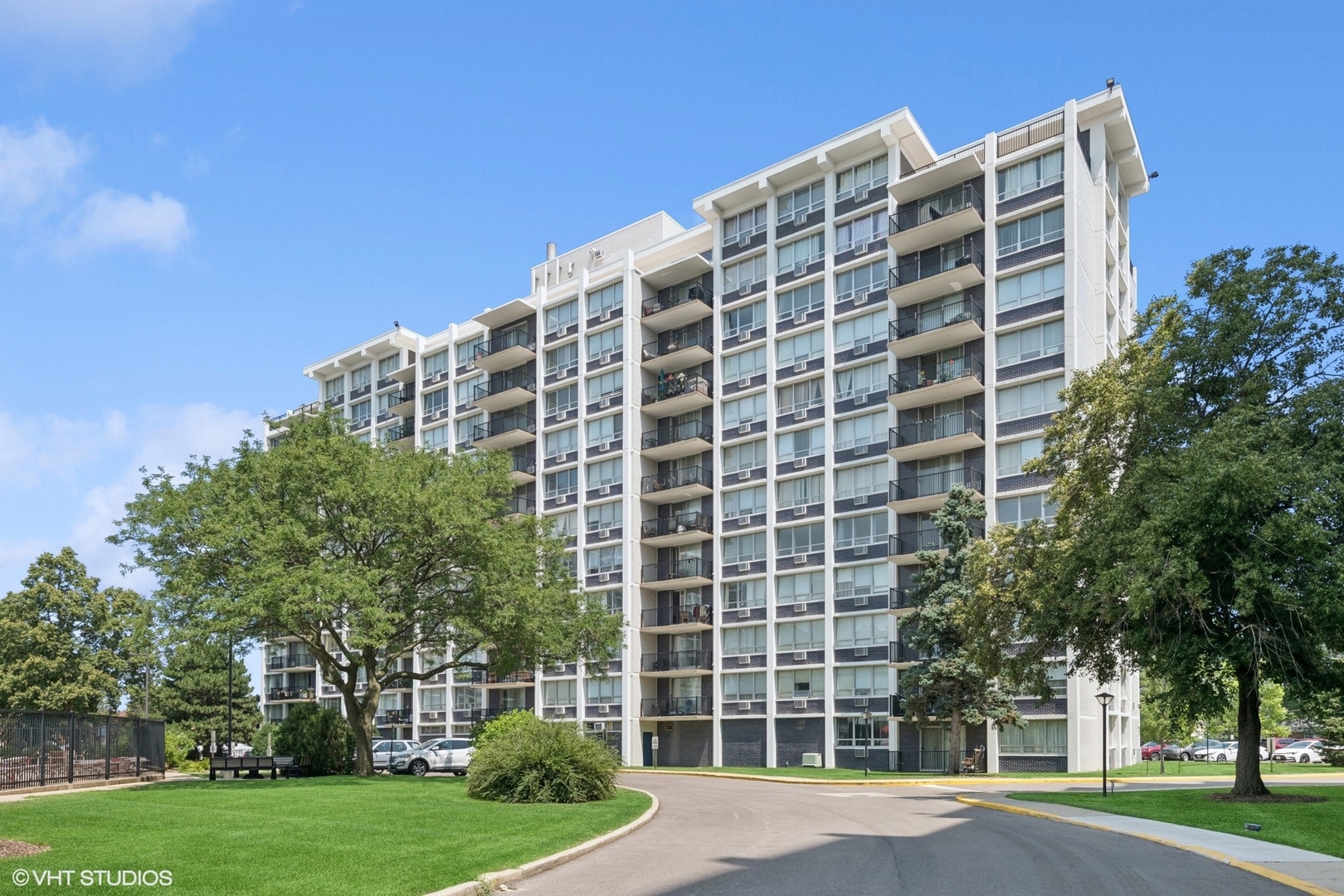 Welcome to Highland Towers - a bright, beautifully updated 2-bedroom, 2-bath corner unit in the heart of Niles!  This spacious home offers a thoughtfully designed layout, an abundance of natural light, and serene views of the pool and landscaped grounds from your private balcony. The updated kitchen is equipped with LG and Whirlpool stainless steel appliances, granite countertops, white cabinetry, a built-in island with seating for four, and a pantry closet for added storage. The adjacent dining area is perfect for entertaining, while the balcony invites you to relax and enjoy the view! The primary suite is a true retreat, featuring an updated bath with porcelain tile, a tub with sliding glass doors, a large white vanity, and a sleek LED mirror. You'll also appreciate the generous closet space, with three separate closets and a dressing area. The second bedroom offers flexibility-ideal for guests, a home office, or a kids' room-and is complemented by a fully renovated hall bath with a walk-in shower. Updated LED lights, updated electrical, wired for cable! This investor-friendly building is ideally located minutes from Golf Mill,  Fresh Farms, restaurants, shops, and public transportation. Assessment include heat, water, gas, parking, cable TV, pool access, building security, and all exterior maintenance. Includes two assigned parking spaces, ample guest parking, and a storage unit.  A turnkey opportunity in one of Niles' most desirable communities-don't miss it!
