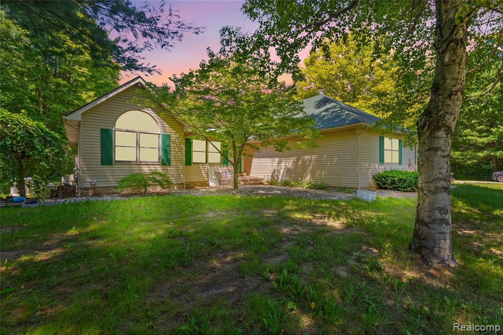 Welcome to 680 S Bartlett Road – a stunning 2,357 sq ft ranch nestled on a serene 5-acre lot in St. Clair Township, offering the perfect blend of privacy, space, and modern comfort. This 3-bedroom, 3.1-bathroom home is packed with features both inside and out. Step into the spacious living room with vaulted ceilings, creating a bright and open atmosphere. The recently updated kitchen is a true showstopper, boasting epoxy floors and countertops, a large island with seating, and a fresh white stone backsplash – ideal for both everyday living and entertaining. A beautiful Florida room adds year-round enjoyment with panoramic views of your private outdoor oasis. The finished basement provides even more living space, including a cozy family room, a wet bar, full bathroom, and a recreation area—perfect for entertaining or relaxing. Enjoy the tranquility of your very own private pond, perfect for fishing, wildlife watching, or simply unwinding in nature. Numerous recent upgrades include new skylights, new furnace, new basement carpet, and new roofs on both the home and outbuilding. The current owner has invested over $50,000 in updates over the past four years, making this home truly move-in ready. This one-of-a-kind property offers the best of country living with the comforts of a thoughtfully upgraded home. Schedule your private showing today and experience the peace and beauty of 680 S Bartlett Road!
