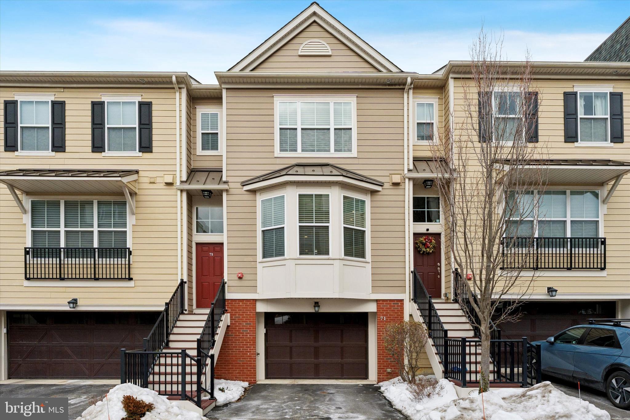 Welcome to refined, low maintenance Main Line living in a great walkable Bryn Mawr location tucked into the sought after Danley community. This beautifully designed 3-bedroom, 3.5-bath luxury townhouse is ideally located in the heart of Bryn Mawr - just steps from Bryn Mawr’s vibrant downtown area, dining, shopping, entertainment, and regional rail (R5/Paoli-Thorndale Line). This stunning home is also within walking distance of Bryn Mawr Hospital, offering exceptional convenience and lifestyle appeal.This light-filled Bryn Mawr townhome features an open floor plan enhanced by upgraded custom woodwork and thoughtful architectural details throughout. Designed for low-maintenance, easy living on the Main Line, the layout offers exceptional functionality and future-ready design, including space for a private elevator.The main level is anchored by a crisp white kitchen with stainless steel appliances, upgraded countertops, and abundant cabinetry and storage—ideal for entertaining and everyday living. The flexible living and dining areas showcase hardwood floors and a gas fireplace, with direct access to the first of two private outdoor balconies.Upstairs, the primary suite in this Bryn Mawr townhouse is a true retreat, featuring two spacious closets and a spa-inspired primary bath with a large tiled shower, double vanity, and linen closet. A second generously sized bedroom, full hall bath, and laundry complete this level.The third-floor has an oversized bedroom and offers a full bath and private deck, creating a perfect guest suite, home office, or private retreat. The finished lower level adds valuable living space with an extra family room or home office, ideal for remote work or additional entertaining. The attached garage opens into the lower level for ease and convenience. Enjoy indoor-outdoor living on the Main Line with two private balconies, abundant natural light, and exceptional closet space throughout. All of this in a prime, walkable Bryn Mawr location near Bryn Mawr Hospital, shops, restaurants, and SEPTA regional rail, delivering the best of luxury townhome living on Philadelphia’s Main Line.