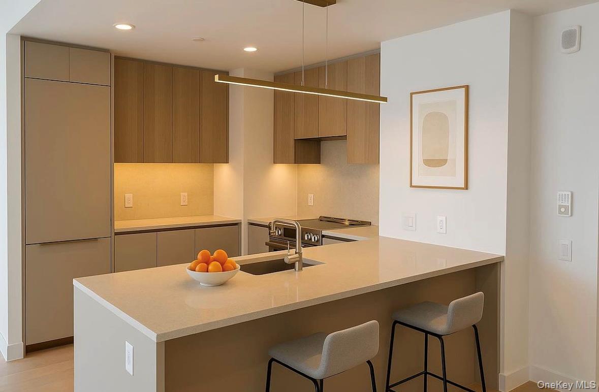 Skyline Tower 5211 – Luxury High-Floor 3BR with Manhattan Skyline Views

Located in Queens’ tallest condominium, the iconic Skyline Tower rises 67 stories in the heart of Long Island City. Perched on a high floor with coveted southwest exposure, Residence 5211 offers sweeping, unobstructed views of Manhattan and the East River — from the Freedom Tower to the Empire State Building.

Residence Highlights
 • Three bedrooms, two full baths, and a powder room
 • Expansive floor-to-ceiling curtain wall windows with abundant natural light
 • Oversized primary suite with walk-in closet and spa-like bath featuring a frameless glass shower, quartz vanity, and elegant light bronze Kohler fixtures
 • Secondary bath with marble vanity, Kohler soaking tub, and bronze accents
 • Powder room finished in warm vanilla marble with bronze inlay
 • European white oak flooring throughout
 • In-unit Bosch washer & dryer

Gourmet Kitchen
 • Chef-inspired open kitchen
 • Sand ash veneer cabinetry with Viatra quartz countertops and backsplash
 • Full Bosch appliance suite + Monogram microwave
 • Vented range hood, ideal for all styles of cooking

World-Class Amenities
75’ temperature-controlled swimming pool, state-of-the-art fitness center, yoga/Pilates studio, sauna, whirlpool spa, steam room, private treatment room, double-height resident lounge, children’s playroom, pet spa, business center, parking, bicycle storage, package room, and more.

Prime Location
Situated in the vibrant heart of LIC, Skyline Tower offers unparalleled connectivity — just minutes to Manhattan via 8 subway lines, 3 ferry routes, and multiple bus options. Surrounded by dining, shopping, cultural attractions, and waterfront parks.