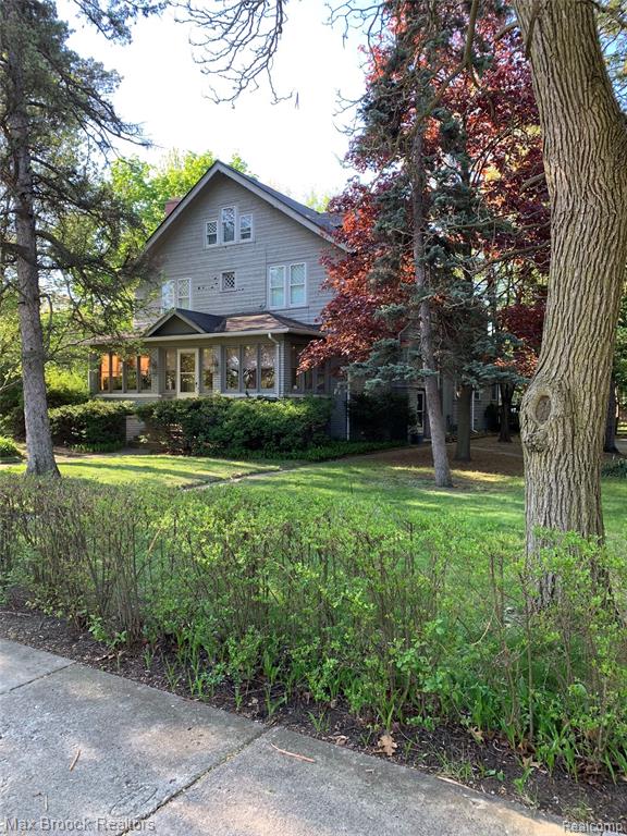 Situated on one of the most picturesque streets in Pleasant Ridge.  This residence offers approximately 6,000 square feet of living space.  Featuring 6 bedrooms and 3.1 baths.  The home is set on a .92 acre lot that may offer the potential to be split.  The custom kitchen and butler's pantry remodeled in 1996, includes quality built-in appliances.  An expansive family room provides the ideal space for gatherings and entertaining complemented by a formal dining room and separate living room.  Stepping through the front door feels like a walk back in time when homes welcomed guests into parlors rather than foyers.  In the  finished basement you will find an ideal game or recreation room, half bath, laundry area, workshop and office With your personal visions and updates, this exceptional property can be reimagined and transformed into the home of your dreams.  BATVI