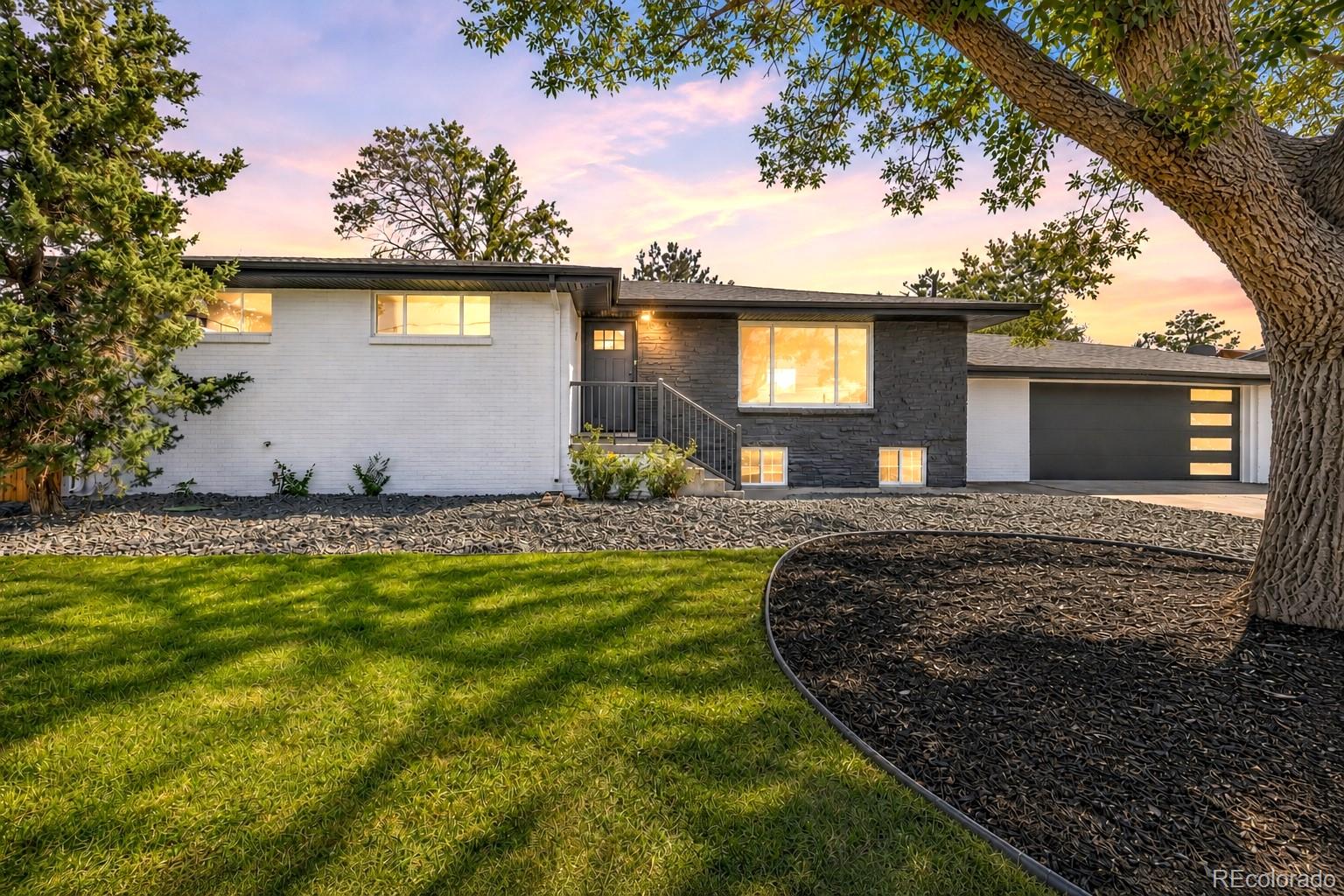 Looking for your modern dream home with room for everyone and everything? Welcome to 6080 Holly Street.With 7 bedrooms, 2 bathrooms, and a huge .28-acre lot, this home offers the kind of space that’s getting harder to find. Whether you need extra bedrooms, home offices, or room for guests, there are plenty of options here.The work has already been done with new interior and exterior paint, new laminate flooring and carpet, restained hardwood floors, LED lighting, and bathrooms with beautiful new tile. The kitchen features a stunning accent tile wall, new soft-close cabinets, quartz countertops, and GE appliances for a clean, modern look.The basement adds even more possibilities with extra bedrooms and a large flex space for a second living room, game room, playroom, or movie room. The oversized laundry room already has a sink, cabinetry, and quartz counters, giving you a head start if you’d like to explore adding a second kitchen area. The downstairs offers great potential for multigenerational living, extended family, or possible rental income.Outside, the .28-acre lot gives you room to enjoy! There’s lush grass, new landscaping, mature trees, a patio, and a propane fire pit with a sitting area, perfect for Colorado evenings. You’ll also have plenty of parking for multiple vehicles, recreational vehicles, and weekend toys, plus a new modern garage door.You’re close to Pioneer Park, DICK’S Sporting Goods Park, Rocky Mountain Arsenal National Wildlife Refuge, trails, recreation, and multiple highways for easy access around the Denver metro area.The sellers are also including a home warranty for the new owner.Seven bedrooms, a huge lot, tons of parking, modern updates, flexible living space, and so many possibilities. Come see 6080 Holly Street for yourself. You don’t want to miss this one!