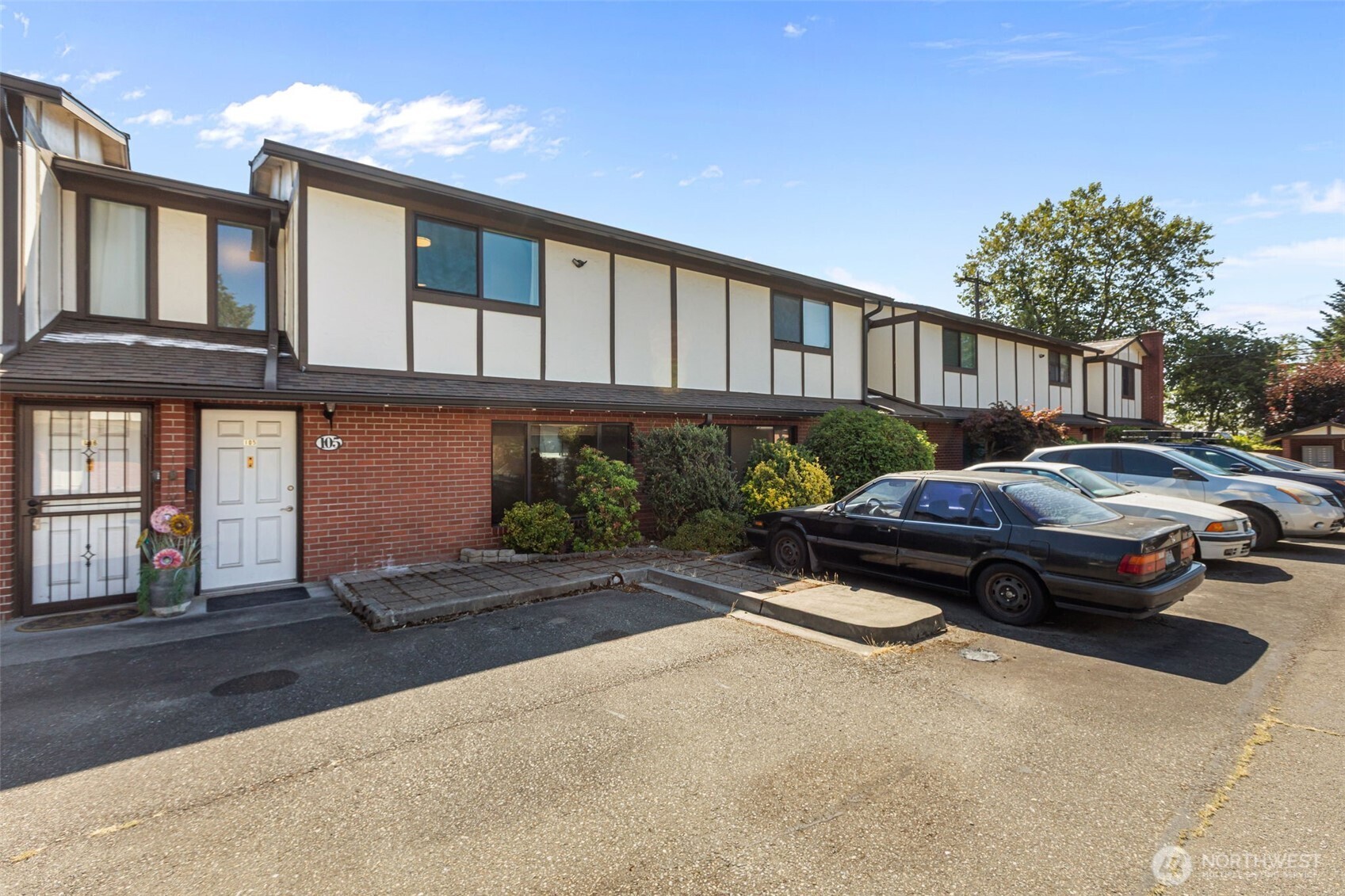 Beautiful 2 Bedroom/ 2 bath condo in the heart of Burien w/wonderful walkability & commuter convenience. Tile entry to laminate thru to open living room with built in shelving & dining the carries to the covered patio that is fully fenced in. Sleek kitchen w/tile floors, quartz counters & glass tile backsplash, breakfast bar & large pantry. Upstairs offers rare dual master bedrooms w/pass thru 5 pc tile bath, each w/private entry. Even a peek a boo Mt. Rainier view! 2 parking spaces, storage closet and laundry room for residents if needed. 5 min walk to Safeway or Fred Meyer and downtown, seconds to Kaiser Permanente. Minutes to freeway access for EZ commute anywhere! Airport 10 minute commute. HOA’s incl W/S/G.