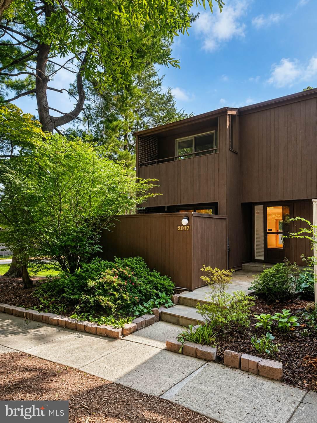 Welcome to 2017 Wethersfield Court, a spacious end-unit townhome tucked into one of Reston’s established, tree-lined communities. Surrounded by mature landscaping and offering wonderful privacy, this 4-bedroom, 3.5-bath home delivers the space, flexibility, and lifestyle that make Reston living so desirable.Step inside to find a bright and inviting main level featuring hardwood floors, beautiful natural light, crown molding, and an open living and dining area ideal for both everyday living and entertaining. The kitchen offers generous workspace, an island, upgraded countertops, and an easy flow into the surrounding living spaces. A fireplace adds warmth and character, while skylights bring additional natural light into the home. The entire home has been professionally painted in August 2026Upstairs, the spacious primary suite provides a private retreat with its own en-suite bath. Two additional bedrooms and another full bath complete the upper level.The fully finished walkout lower level adds an incredible amount of versatility, featuring a fourth bedroom, full bath, family/recreation space, and direct access outdoors, perfect for guests, a home office, fitness space, or multigenerational living.As an end-unit, the home enjoys additional privacy along with a peaceful setting framed by mature trees and greenery. And then there is the location—everything people love about Reston is right outside your door. Enjoy miles of trails, lakes, parks, pools, recreation facilities, shopping, dining, and easy access to major commuter routes and the Silver Line Metro.2017 Wethersfield Court offers the rare combination of space, privacy, natural surroundings, and an outstanding Reston location. Come experience everything this home, and the Reston lifestyle—has to offer.