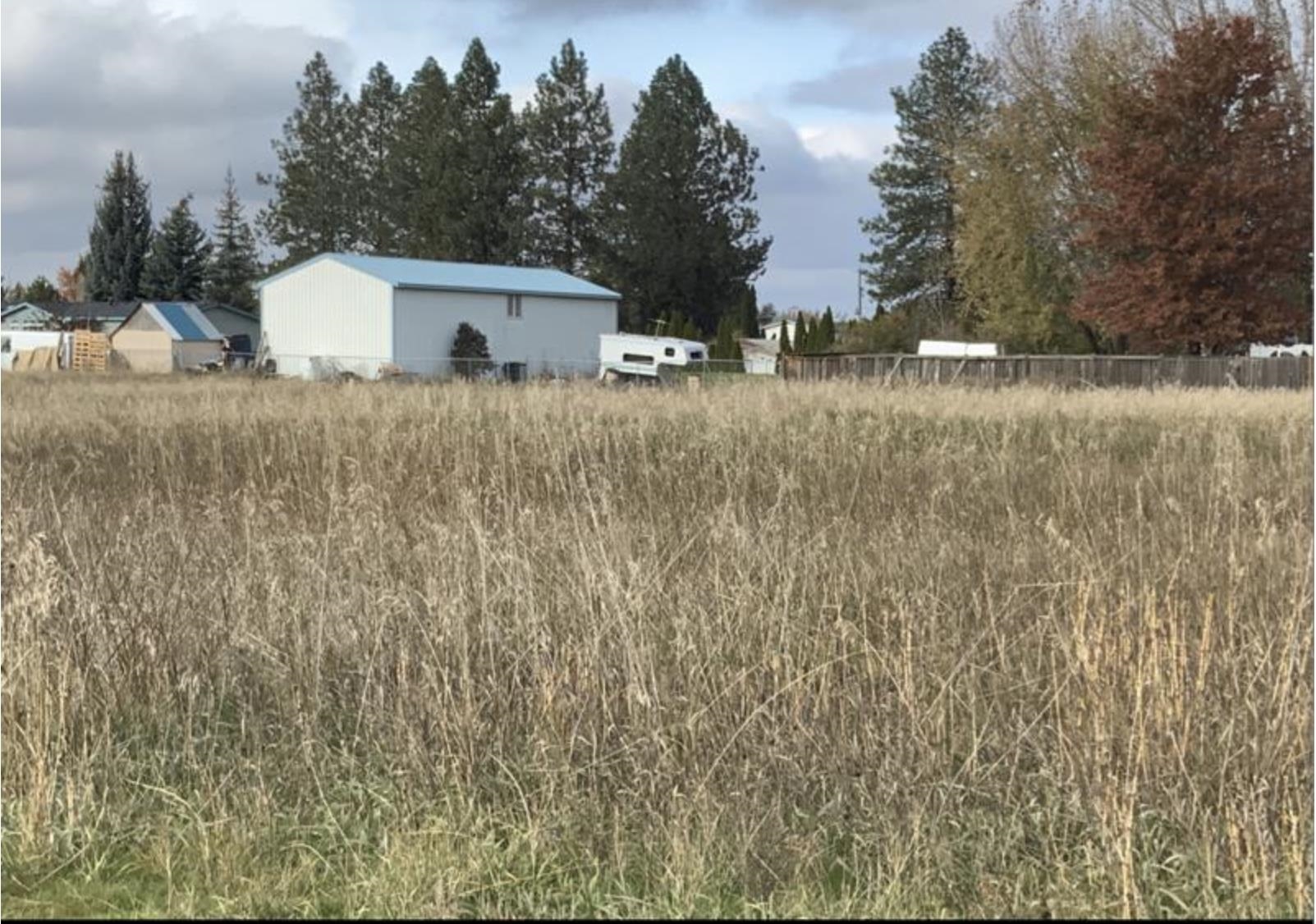 2.56 acre property segmented in to 6 parcels available with development potential in Mead area. Zoned Low Density Residential so duplexes are allowed. Short plat into large parcels or long plat in to many more! Utilities available but not connected. 6 parcels total available. Parcels will need to have a plat alteration to be buildable.