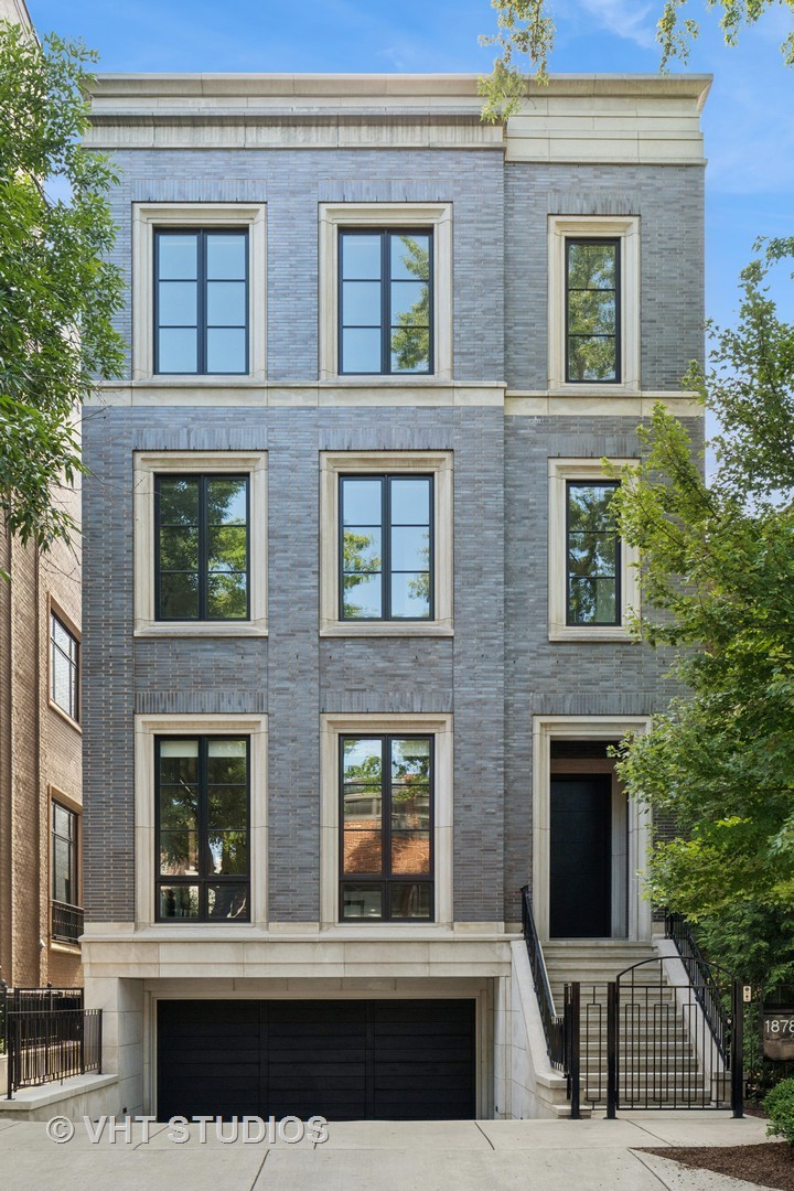 Stunning beyond words, this East Lincoln Park masterpiece redefines luxury at every turn. Set on a 36x131 on coveted Orchard street, this 9,500 square foot home speaks to a most discerning buyer seeking the ultimate blend of superior craftsmanship and refined luxury. A chic city retreat featuring a plunge pool and beautifully landscaped yard. Upon entering, you are welcomed by the striking drama of a museum-quality marble foyer, soaring ceilings, and an expansive living and dining room with floor-to-ceiling bespoke marble fireplace. At the heart of the home is a stunning statement De Giulio kitchen featuring Wolf and Sub-Zero appliances, a butler's pantry, and an artful mix of Lotus White Similaque, stainless steel, and Gloss Fumed Eucalyptus cabinetry. Iceberg Quartzite counters, Peruvian Walnut accents, and high-gloss Farrow & Ball millwork elevate both form and function. An adjacent family room, anchored by a hand-scraped stone wall, opens seamlessly to the terrace, pool, and landscaped yard-perfect for refined indoor-outdoor living. Throughout, ebony-hued wide-plank heirloom white oak floors are paired with a striking custom metal and glass staircase, tying the home's design elements together with timeless elegance. The primary suite exudes refined elegance and combines luxury with impeccable practicality, boasting a serene sitting area enhanced by a dual-sided gas fireplace framed in exquisite Iceberg Quartzite. The adjoining designer primary bath, adorned in stunning Calacatta Gold marble, offers a spa-like experience, complemented by two very generously appointed closets, two bathrooms, and jacuzzi tub. Designed for effortless living, the home features 3 custom laundry rooms, full-home automation and security, radiant heat with snow melt, 14-zone cooling, and whole-house water filtration. A discreet front curb-cut leads to a private driveway and heated garage, offering 2 indoor spaces and 3 additional outdoor spots-providing secure parking for up to 5 vehicles. Additional highlights include Marvin windows and doors, 800-amp service, backup generator, air-conditioned patio storage, elevator to all levels, and a build-ready roof. This exceptional residence is a rare opportunity to own a legacy home on one of Chicago's premier residential streets, located in the heart of Lincoln Park, just steps from renowned schools, boutique shopping, and some of the city's best dining.