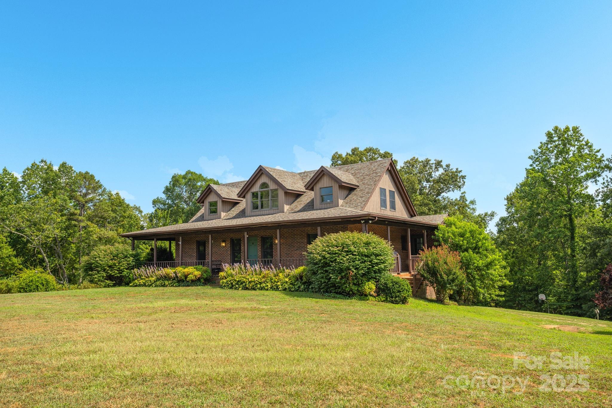 OPEN HOUSE - 2-4PM SUNDAY 12/7! Homestead Dreams Come True on Nearly 50 Acres in Rutherfordton! Welcome to your next home where rustic charm meets mountain magic! This private unrestricted 49+/- acre property is the ultimate canvas for your dreams whether you’re looking to start a working homestead, create a peaceful 2nd home, or just need wide open space to breathe deep & live free. From the moment you arrive, you’ll feel the character woven into every inch, including a repurposed tobacco barn workshop, gorgeous post-and-beam architecture, & a home that’s filled with warmth & light. Outside follow trails that wind through rolling hills, lead to a creek, & reveal stunning mountain views. Electric & privacy fencing, 3 stall BARN, a pasture ready for horses, cattle, pigs, you name it. Fruit & nut trees. The unfinished basement gives room to add a 2nd living area, workshop, gym, or hobby haven. No restrictions, no limits, just pure possibility. Just minutes from Rutherfordton surrounded by nothing but mountain serenity.