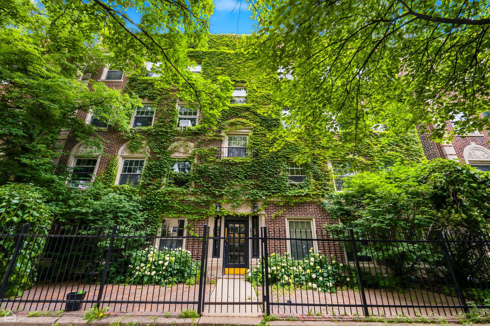 Top-floor vintage condo with massive space, central air, in-unit laundry, on-site parking and storage included. Barrel-vaulted gallery ceiling, beautiful original millwork, and graceful wall moldings set the tone for this 3 bdrm plus office, 2 bath condo. The expansive living room invites you to relax beside a classic decorative fireplace framed by custom built-in shelving - the perfect backdrop for cozy evenings or stylish entertaining. The generous dining room effortlessly accommodates a table for 12 or more, making it ideal as a grand entertaining space or a comfortable family gathering room. The renovated kitchen has stainless steel appliances, abundant cabinetry, and counter space - a true chef's delight. The butler's pantry adds more storage, a dedicated wine fridge, and a washer/dryer. Two king-sized front bedrooms share the primary bath featuring both a deep soaking tub and a separate shower. A third bedroom tucked privately off the kitchen enjoys its own lovely renovated bath. The east-facing sun-drenched back sunroom offers endless versatility - a private office, cozy den or a creative studio.  EZ walk to Target, the new Metra station at Peterson and Ridge, Peterson Bus to Ridge redline, the Fireside Restaurant, Misericordia Bakery and Cafe, and Edgewater/Andersonville/Devon Street restaurants and nightlife.  Investors welcome!  Don't miss this, nothing else like it!