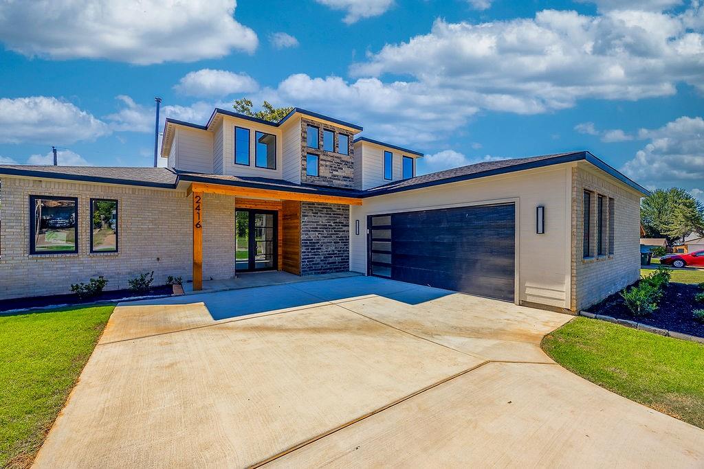 APPRAISED AT $665,000 — WALK INTO INSTANT EQUITY!
This stunning brand-new home in the heart of 76016 combines luxury finishes with thoughtful design. From the moment you walk in, you'll be wowed by custom accent walls, designer light fixtures, and a modern aestheticthroughout. The chef’s kitchen features a large island, perfect for hosting, and flows beautifully into the open-concept living space. Enjoy oversized walk-in closets, a spacious walk-in pantry, a mudroom area, and even extra storage space in the garage—complete with a custom designer garage door. The primary suite is a true retreat with private access to the covered back patio, ideal for sipping morning coffee while enjoying the lush backyard and mature trees. With a layout made for entertaining and upgrades at every turn, this home is ready for your next chapter. Plus—you’re starting with equity already in place.