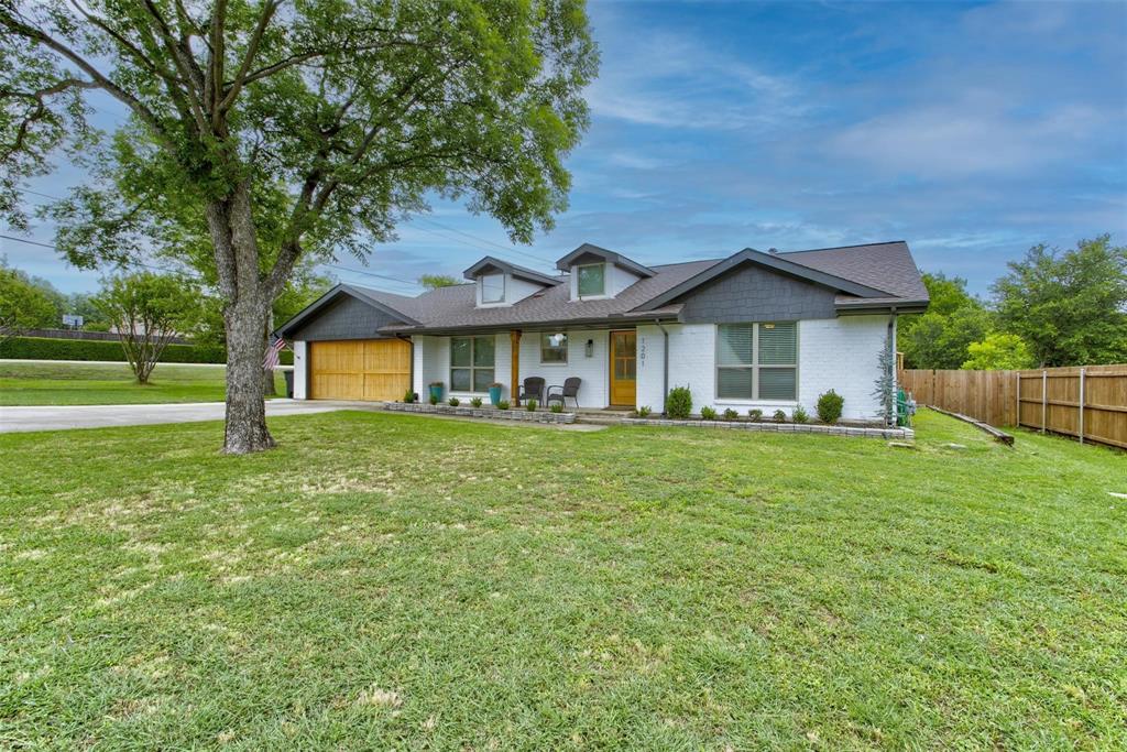 Welcome to your private retreat in the heart of Southlake! 1201 Oakhurst Dr has it all! Fully remodeled in 2023, the home has an all-new kitchen with Whirlpool stainless steel appliances, on-trend yet timeless bathrooms, new flooring and light fixtures throughout, as well as new windows, HVAC, sprinkler system, and newer water heater. The living room features vaulted ceilings with beams, offering original charm with the conveniences of modern life, and beautiful coffee bar-wet bar for entertaining. The spacious primary bedroom offers a walk-in closet, en suite bathroom and private entrance to the tranquil back yard. This spectacular home allows you to live out your outdoor dreams in the expansive ~ half-acre yard, including covered back porch with TV, tree house, and room for gardening, playing, lounging, so much more (riding lawn mower conveys)! Walk to Carroll Elementary, zoned excellent rated Southlake Carroll ISD. Located in established Continental Park Estates with no HOA, close to jogging and biking paths with easy access to highways for a quick commute. Schedule your showing today!