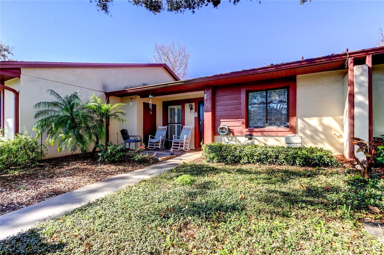 SNOWBIRDS OR DOWNSIZING?  THIS PICTURE PERFECT, MOVE-IN READY CONDO IS PRICED TO SELL. FRONT PORCH OVERLOOKING A PRETTY POND, WELCOMES YOU INTO A BRIGHT AND OPEN LIVING AREA.  LAMINATE AND CERAMIC FLOORING THRU OUT WITH NO CARPET.  ROOF 2015(COVERED BY ASSOCIATION), AC 2021 AND WATER HEATER 2021.  ENCLOSED LANAI WITH HEAT AND AIR AND INDOOR LAUNDRY.  PRIMARY BEDROOM W/ENSUITE BATH AND WALK-IN CLOSET.  LARGE HALLWAY PANTRY/STORAGE CLOSET, NO REAR NEIGHBORS.  1 CAR CARPORT AND GUEST PARKING, COMMUNITY POOL AND ONE CAT or ONE DOG ALLOWED.  FURNISHINGS ARE NEGOTIABLE.  THIS IS A MUST SEE!