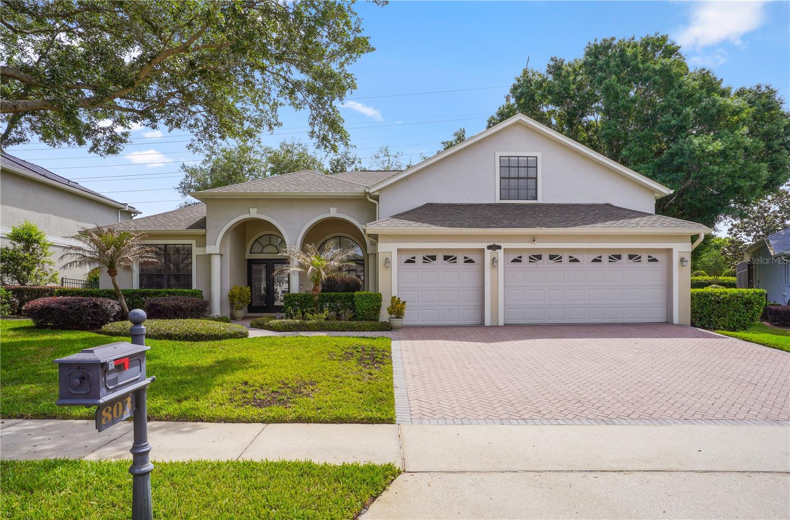 Welcome to 803 Blairmont Lane in the Reserve at Lake Mary, where comfort, space, and convenience meet. Enter through a grand foyer with a private home office to the left and a formal dining room to the right, leading into a spacious living area designed for both relaxation and entertaining. The kitchen features granite countertops, stainless steel appliances, a breakfast bar, a pantry, and a bright breakfast nook. The split floor plan offers an oversized primary suite with dual walk-in closets, two vanities, a soaking tub, a walk-in shower, and a private water closet, while the opposite wing includes three large guest bedrooms with built-in closets and two full bathrooms. Flooring includes ceramic tile, hardwood, and laminate throughout. Upstairs, a large bonus room adds flexible living space for a media room, office, or gym. Enjoy outdoor living on the covered lanai overlooking a shaded backyard with room to add a pool. Additional features include a brick paver driveway, AC replaced in 2023, electrical updates in 2023, and a new water heater in 2026. Located in an established Lake Mary community close to top-rated Seminole County schools, shopping, dining, parks, and major highways including I-4, 417, and 429, this home offers both lifestyle and location.