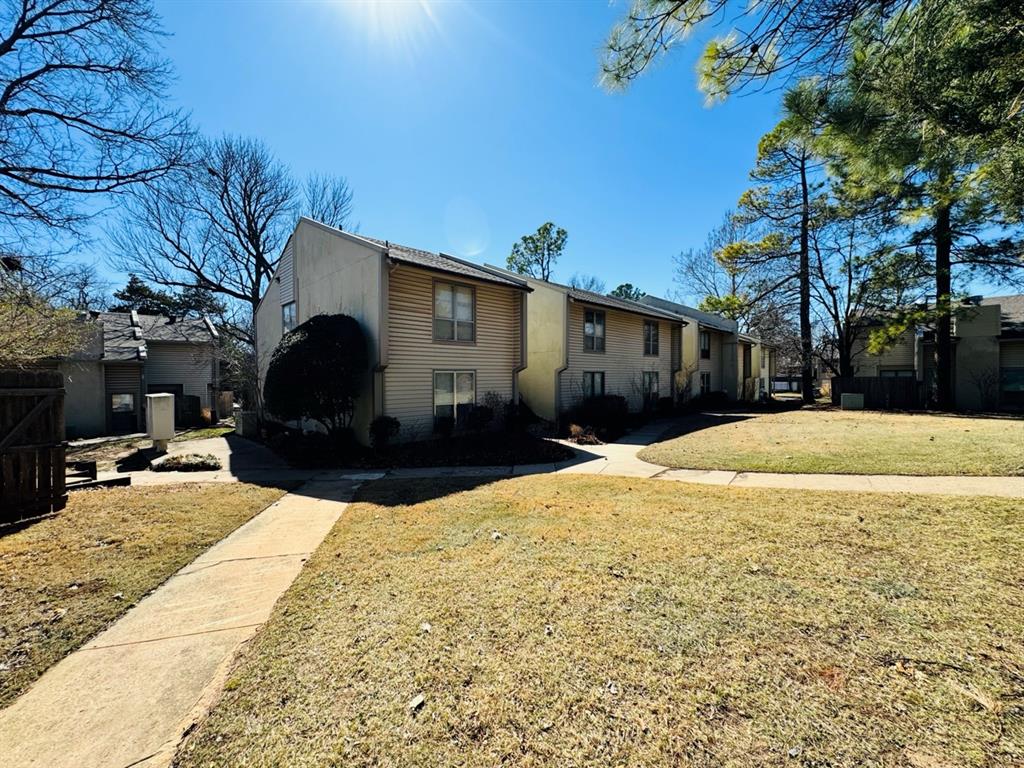 Great opportunity to buy an updated 1 bed 1 bath apartment less 3 miles from campus with quick access off of Hwy 9. This apartment has newer flooring, new quartz counter tops, new kitchen range and microwave, fresh back splash in the kitchen, new light fixtures, updated bathroom vanity and all new bathroom shower tile. The living room is oversized with a nice dining area and lots of natural light. The bedroom features 2 closets. And just outside the bedroom you'll find another storage closet in the hallway as well as a built in cabinet in the living room for storage as well. Just through the kitchen back door is your own private fenced in patio. Apartment is situated by a large grassy area and the community pool, bbq area and mail box area.