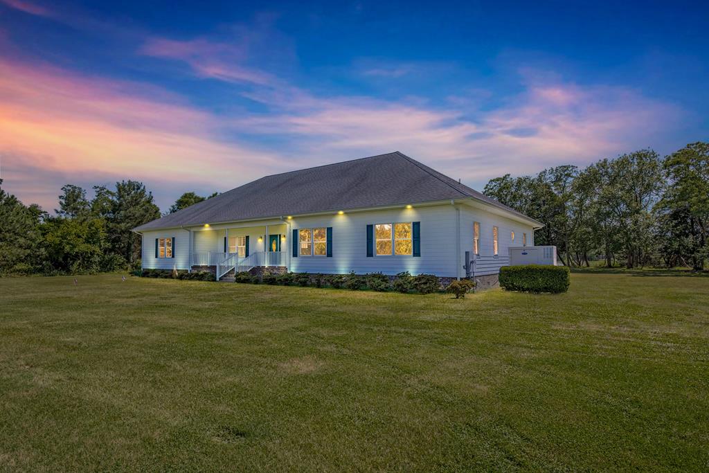 WOW! Don't miss this one! This stunning, one owner, custom designed and built home has so much to offer it can't all be covered here! You really have to see it to believe it! Starting with the  beautiful 6.2 acre bayside waterfront lot to the thought and care the owner/builder put into this home shows throughout! Virtually everything that went into this home was upgraded well above builder grade to include the roof, siding, doors, windows, commercial grade appliances, 2 tankless water heaters, 2 dishwashers, 2 islands, warming drawer, 2x6 ext. walls ,  Even int walls fully insulated, generator and so much more! Even the crawlspace was upgraded! Preinspected for your peace of mind and report available upon request. Even priced over $70k below appraisal! This is a very high quality property!