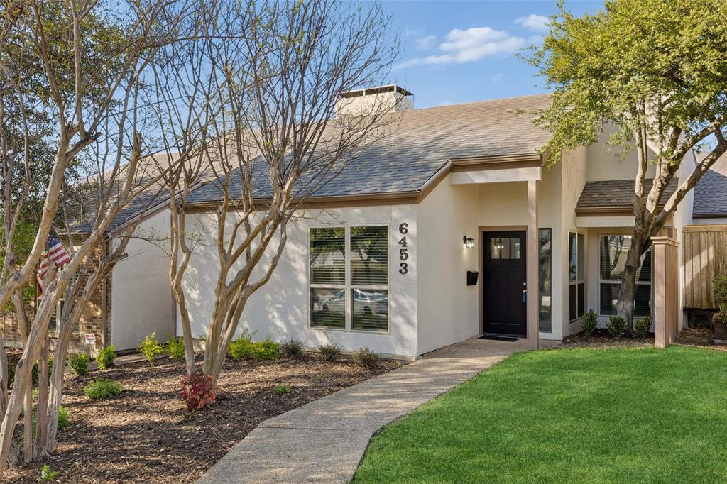 Meticulously maintained, move-in ready, and beautifully updated, this inviting home blends comfort, style, and thoughtful upgrades throughout. New engineered wood floors add warmth and charm, while high-quality Brennan replacement windows enhance energy efficiency and natural light. Major updates provide peace of mind, including replaced kitchen appliances, a new water heater, and an updated electrical circuit breaker panel.The spacious living room sits at the heart of the home and features a stunning vaulted beamed ceiling and a cozy fireplace flanked by custom bookshelves and built-in cabinetry—creating the perfect setting for relaxing or entertaining. Large windows throughout the home stream in abundant natural light, adding to the bright and welcoming atmosphere.A split-bedroom layout offers privacy, with each bedroom featuring generous closet space and its own bathroom. The dining room is accented by a stylish light fixture, while the kitchen is a chef’s dream with multiple skylights, wood beam accents, and a sunny breakfast area that feels open and airy. The breakfast area provides direct access to the outdoor deck—perfect for enjoying fresh air and morning coffee.The laundry room accommodates a full-size washer and dryer and includes built-in cabinets for additional storage. A two-car attached garage adds convenience and security. HOA includes landscaping, irrigation and pool.  Ideally located off Campbell Road with easy access to everything North Dallas has to offer. Schedule your private showing today—this is an opportunity you don’t want to miss.