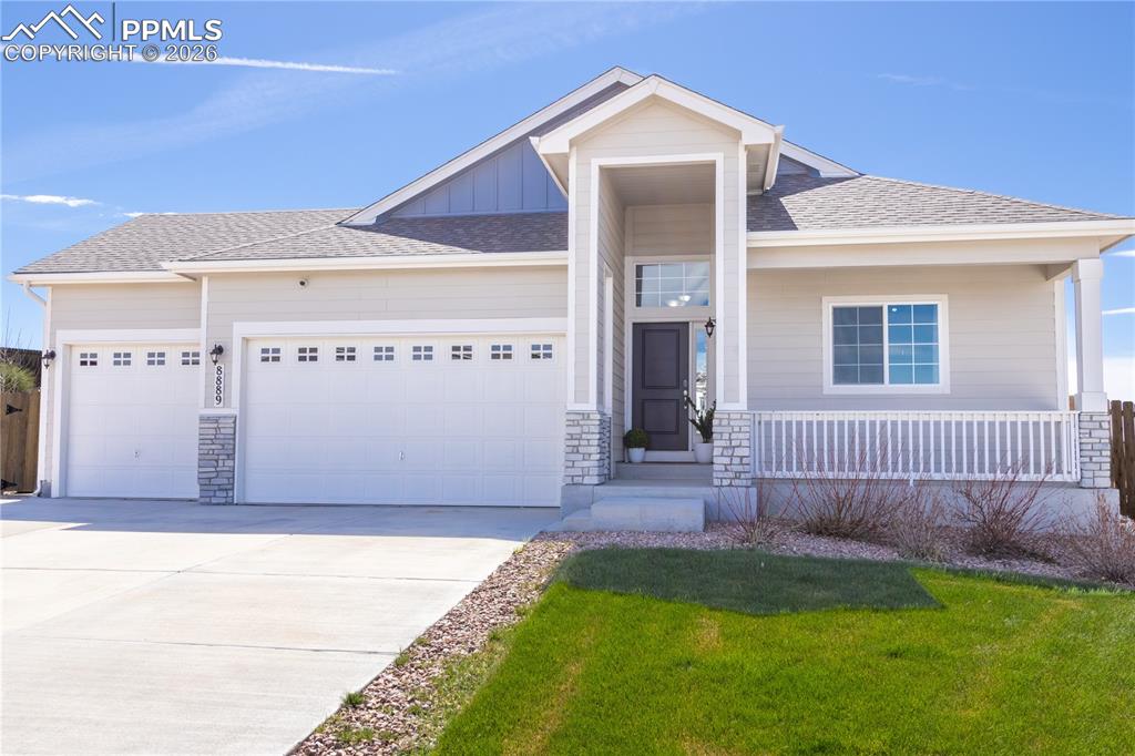 Welcome to this beautifully upgraded 2021-built ranch-style home offering 5 bedrooms, 3 bathrooms, and 3,200 finished sq ft on a 0.32-acre lot backing to open space. The bright open-concept layout is filled with natural light and features a chef’s kitchen with a large island, gas cooktop, stainless steel appliances, and elegant quartz countertops. A fully finished basement, vaulted ceilings, and a cozy fireplace add to the home’s comfort and functionality. This home stands out with extensive energy and infrastructure upgrades, including a 12.8 kW solar system producing approximately 17.1 MWh annually; well above typical household usage in Colorado Springs, paired with a Powerwall (13.5 kWh). Excess energy may be exported back to the utility at lower rates (approx. 0.04/kWh), creating a year end rebate for the homeowner. Additional features include an EV charger, extra 220V garage outlet, and a 220V hot tub-ready connection. Enjoy a complete smart home setup with Nest (doorbell, lock, cameras, thermostat) and Z-Wave lighting and sensors. Comfort upgrades include an Aprilaire 800 steam humidifier, water softener, and reverse osmosis system. The backyard is designed for both relaxation and functionality with custom landscaping, raised garden beds, established multi-variety fruit trees, and a modern 8x7 storage shed (6 months old). Located near parks, trails, and shopping.