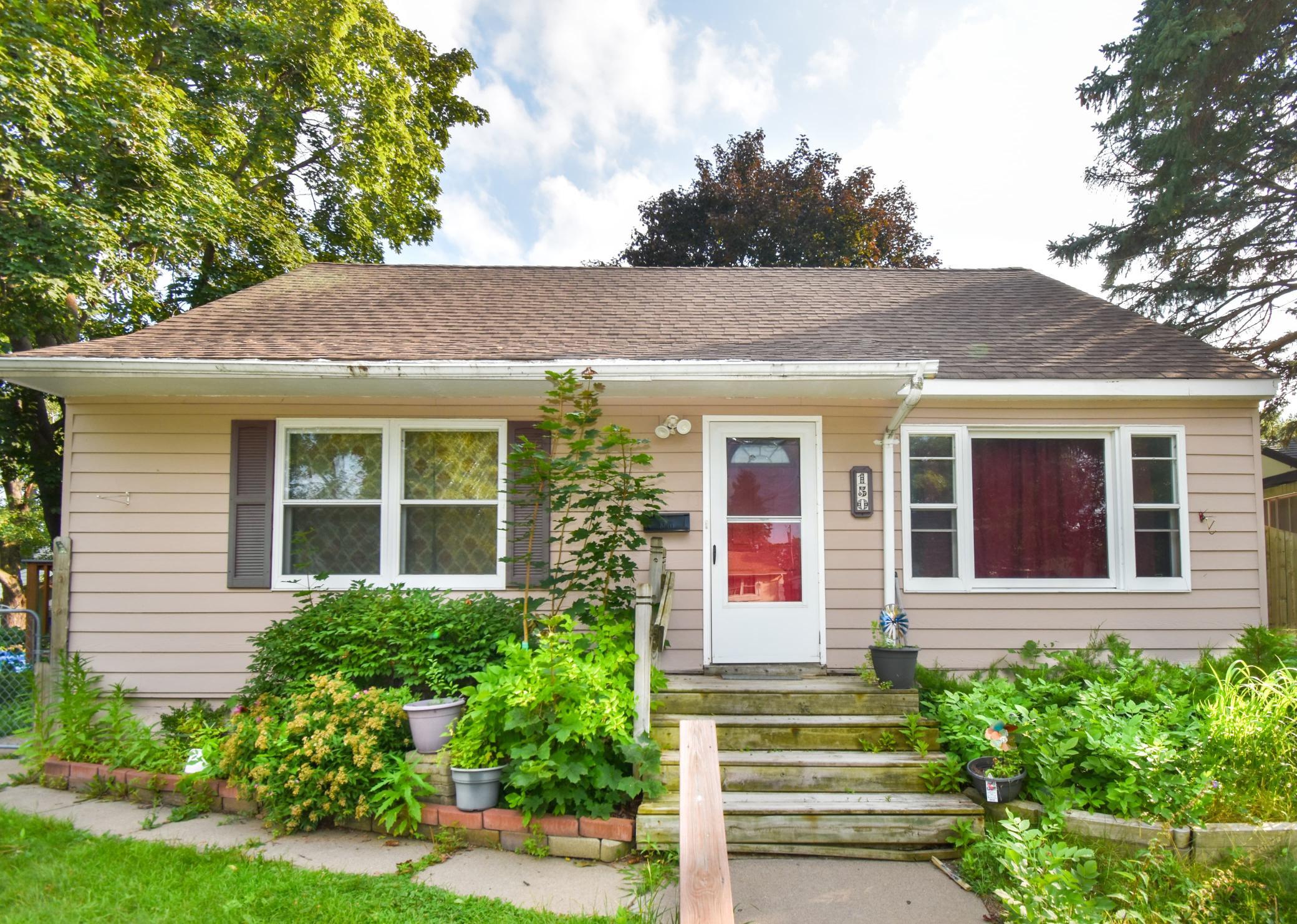 This charming 3-bedroom, 1-bath home offers a spacious main level with both a living room and a large family room, plus a master bedroom that opens directly to the sunroom, a unique feature you’ll love. The kitchen opens to the family room and includes a breakfast bar for casual seating. Enjoy the convenience of main-level laundry. Step outside to a fully fenced backyard with an expansive wrap-around deck.  Located close to schools, restaurants, and parks. Don’t miss out!