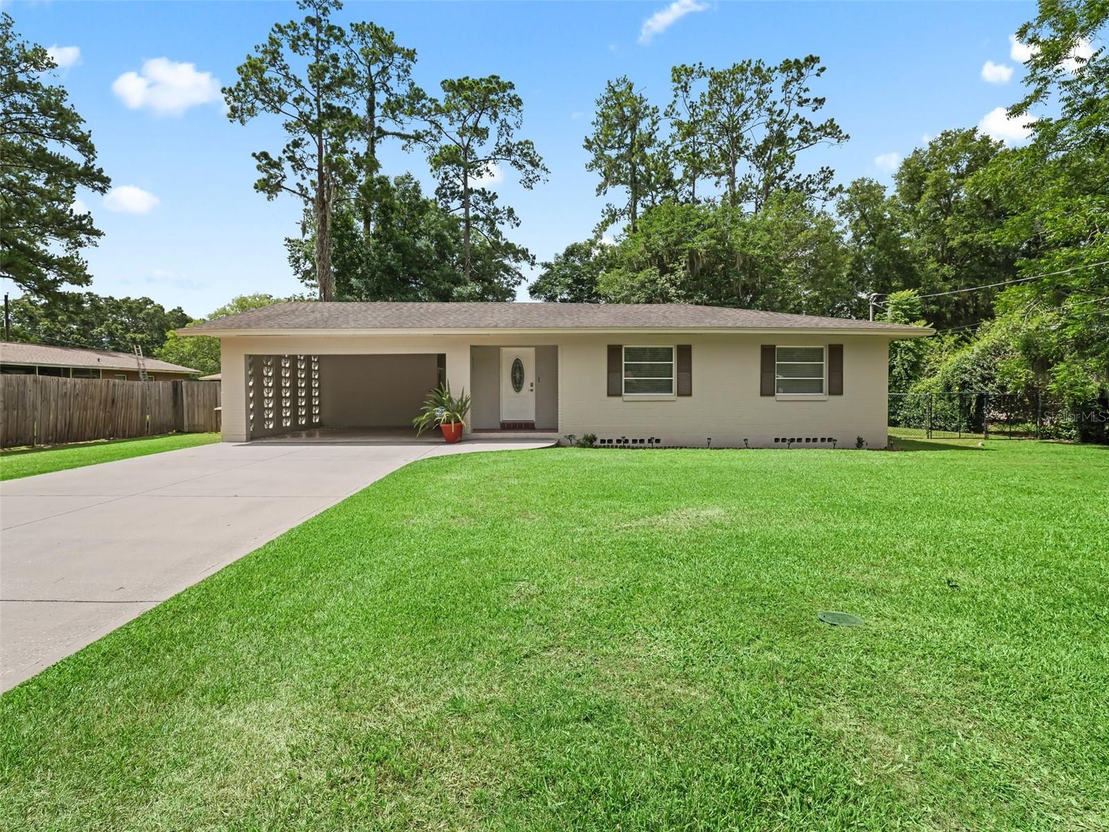 This property is a rare find for the savvy investor: a turnkey, high-performing short-term rental with a PRIVATE POOL that blends 1960s character with the modern amenities travelers crave. Located in a high-demand corridor near Silver Springs State Park and the World Equestrian Center, this home offers immediate cash flow and long-term appreciation potential. The interior preserves its 1960s soul while offering a practical design with a radial "flow" that maximizes guest comfort. Featuring original, well-maintained hardwood floors two seperate living areas, a spacious kitchen equipped with new stainless steel appliances, and a dedicated hallway that separates the 3 bedrooms from the social living areas, ensuring quiet for sleeping guests. The backyard is engineered for low-maintenance luxury and high-impact guest reviews. A clever 3rd bathroom and utility room are located off the pool deck. This serves as a "mud room" or "cleanup station" where guests can wash off and store gear without tracking mess into the main house. A sun-drenched, moderately sized pool (optimized for easy maintenance) is surrounded by a massive concrete slab perfect for both relaxing and soaking up the serene atmosphere or entertaining. The back side of the yard is adorned by mature landscaping, shade trees, and complemented by a large storage shed for maintenance supplies or guest equipment. This versatile property can easily accommodates RVs or horse trailers, a massive "value-add" for the Ocala market. It also has high-value proximity to Historic Downtown Ocala AND is situated on a quiet dead-end street with no through-traffic. This listing is designed for a seamless "Day 1" operation. Everything from the furniture to the established rental history is ready for transfer without gaps in booking revenue. Whether you are looking for a high-yield short-term rental, a winter retreat, or a strategic buy-and-hold, the flexibility of this property is unmatched.