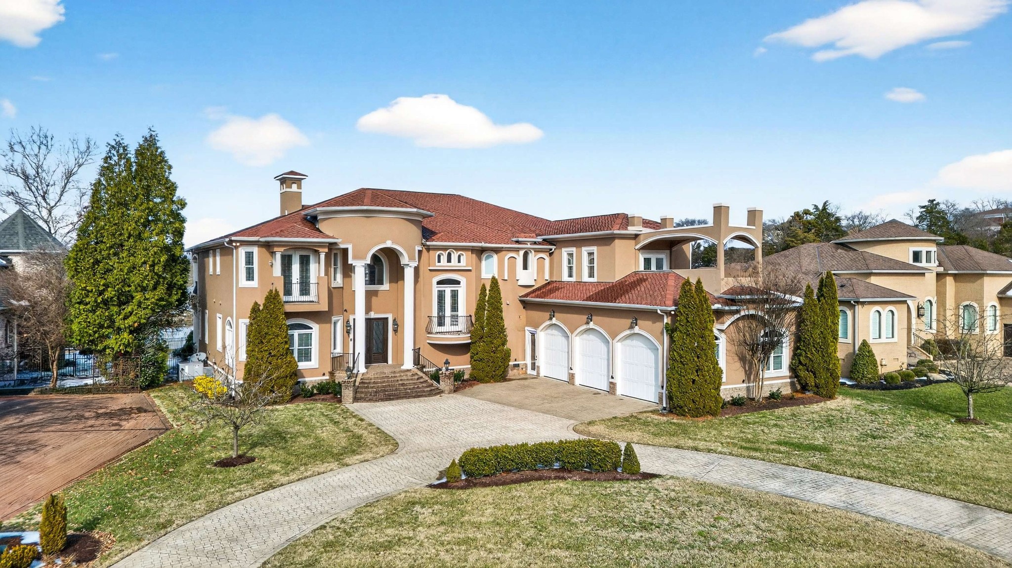 This Golden opportunity awaits you! Gated Brandywine Harbor* Enjoy Old Hickory Lake lapping at your backyard* Dramatic 2-story foyer* 2 owner's suites~ one on each level* Updated kitchen Quartzite countertops* Striking, newer upstairs owner's bathroom~ bright & beautiful! Oversized shower & separate tub* Great closets throughout* Excellent storage* 3 Car Garage* Storm shelter* Reserved #7 covered slip in Community boat dock with lift* Neighborhood pool*