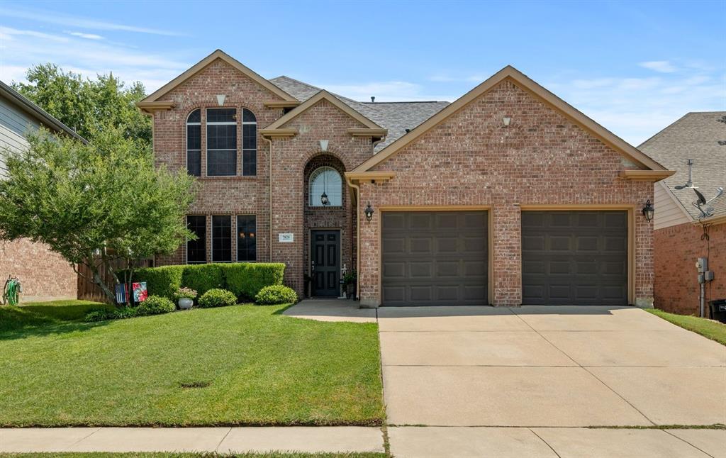 Come see this gorgeous 4 bedroom, 2.5 bath home located right on a scenic 217 acre park!  
Inside you will find beautifully updated floors and a completely remodeled kitchen with incredible cabinet space and elegant Taj Mahal quartzite countertops.  The many windows provide overflowing natural light and the open concept floor plan is perfect for entertaining and spending time with family and friends.  The stately Granbury stone fireplace with cozy gas logs gives a warm feeling and is wonderful during the holidays!  The large dining room is also excellent for entertaining and can easily be converted to an office, playroom, or third living space.  The primary bedroom with ensuite is on the first floor.  Upstairs you'll find a spacious game room, three generous bedrooms, and a bathroom with dual sinks and newly retiled shower.  The large backyard has a spacious covered patio, with a built in Granbury stone grill designed to match the inside fireplace and kitchen.  The covered patio looks out over many flowering trees, rose bushes, and green grass.  Numerous updates to the home include both AC systems, flooring throughout, new tile in shower and tub, fireplace, outdoor grill, hot water heater, and paint.  
The home is directly across from the large Arcadia Trail Park with extensive walking and biking trails, tennis courts, play areas, frisbee golf, and more.  It is within walking distance to Park Glen Elementary School and is also perfectly situated to watch the park’s Fourth of July fireworks from your front yard!  
Located in highly rated Keller ISD, this home has easy access to shopping in Alliance, Presidio, and the new HEB, along with dining, theaters, schools and major commute routes.