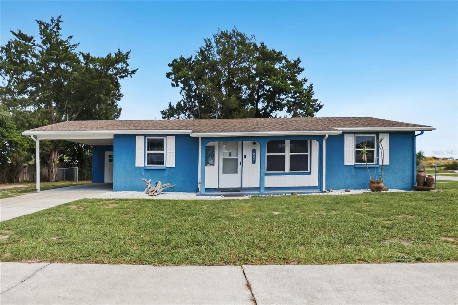 The interior has been freshly painted throughout in a clean, neutral palette. The kitchen features a new stainless steel dishwasher and vent hood. A one-car carport provides convenient covered parking, and solid block construction adds lasting durability.Conveniently located off Northcliffe Blvd with easy access to US-19, nearby shopping and dining, Weeki Wachee Springs State Park, and the Gulf Coast. A great opportunity for first-time buyers, downsizers, or anyone seeking low-maintenance living without HOA fees.