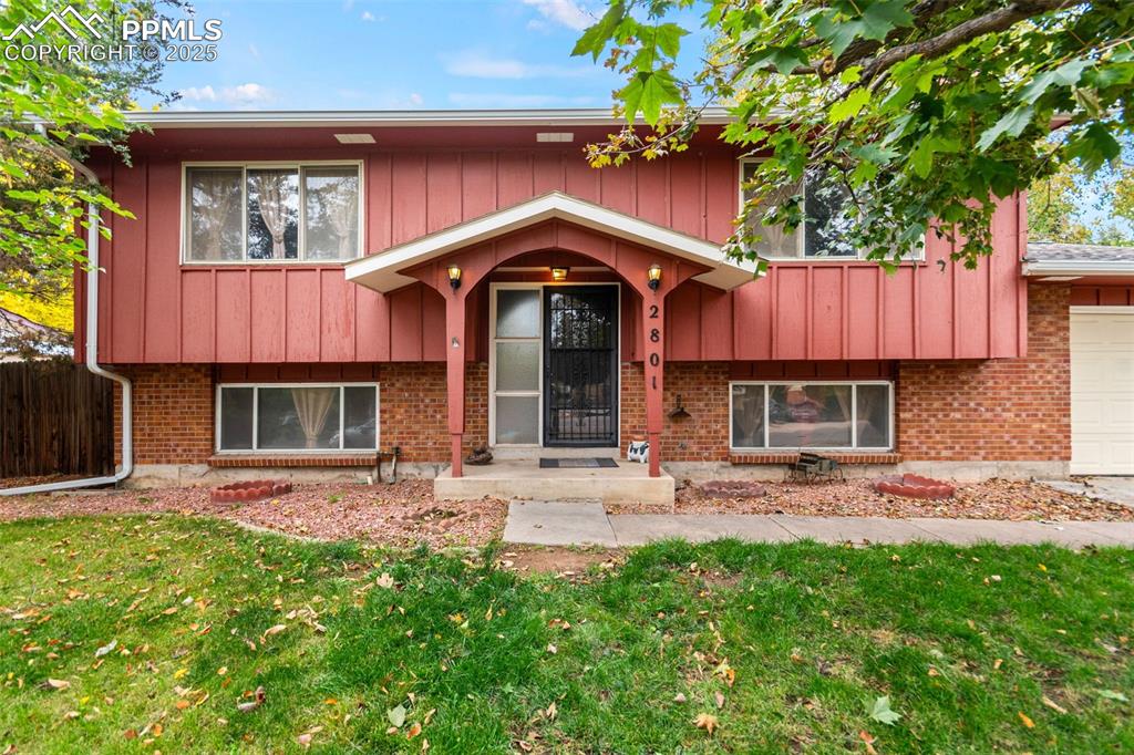 WELCOME HOME to Bear Valley West — where timeless charm meets modern living. This beautifully updated bi-level home sits on a peaceful, tree-lined street surrounded by mature landscaping that adds natural beauty and privacy. Inside, you’ll find newly refinished hardwood floors, fresh interior paint, upgraded electrical & fixtures, and sun-filled living spaces that instantly make you feel at home. The bright, open living room features a large picture window and flows seamlessly into the dining area, which opens to a covered deck overlooking the spacious backyard — perfect for year-round entertaining, morning coffee, or relaxing in the shade while enjoying the peaceful surroundings. The kitchen has been remodeled with new stainless steel appliances, Calacatta Quartz counters, tile backsplash, painted cabinetry, and stylish finishes that bring fresh energy to the home. Upstairs, two comfortable bedrooms share an updated full bath, while the lower level offers new carpet, a large family room with a cozy wood-burning fireplace, two additional bedrooms, and a newly refreshed ¾ bath. Also on the lower is a storage space and laundry space. Outside, the generous lot is filled with mature trees that provide shade and privacy, a handy storage shed for tools & outdoor gear, and plenty of space to garden, play, or host gatherings. Additional highlights include a new roof, one-car garage, extra driveway parking, and ample street parking for guests. Located just minutes from Bear Valley Park, Tennis Courts, trails, and shopping, this home offers the perfect mix of outdoor recreation and urban convenience. With its thoughtful updates, inviting spaces, and prime location with easy access to main roads for easy commutes, this Bear Valley gem truly has it all — a beautiful blend of history, comfort, and Colorado living at its best. Don’t miss the chance to make this warm and welcoming home your own and start creating lasting memories in one of Denver’s most sought-after neighborhoods!