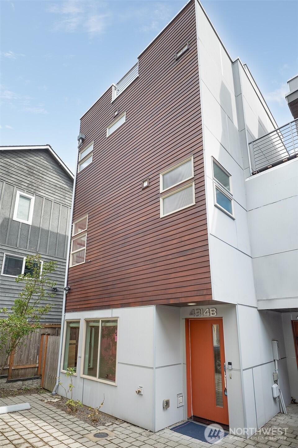 Welcome to Wallingford, and an opportunity to own a stylish Seattle townhome in one of the city’s most desirable neighborhoods. Built in 2018, this light-filled home offers the space, modern finishes and low-maintenance lifestyle that make first-time ownership easy. Hardwood floors, newer bedroom carpet and quartz countertops complement the open, inviting design. The spacious primary suite features floor-to-ceiling windows, walk-in closet and a beautifully appointed bath with double vanity and large shower. Two additional bedrooms and a full bath are on the ground level. Upstairs, you will find the rooftop deck is the perfect place to entertain, with a gas stub for your BBQ and views of Mount Rainier, Lake Union and downtown Seattle. Enjoy a private, side yard that is easy to maintain with artificial turf. Walk to Green Lake, 45th & Stone Way shops and restaurants, and enjoy quick access to Fremont, Lake Union, I-5 and Highway 99. No HOA dues or rules. A smart way to put down roots and own a piece of Seattle.
