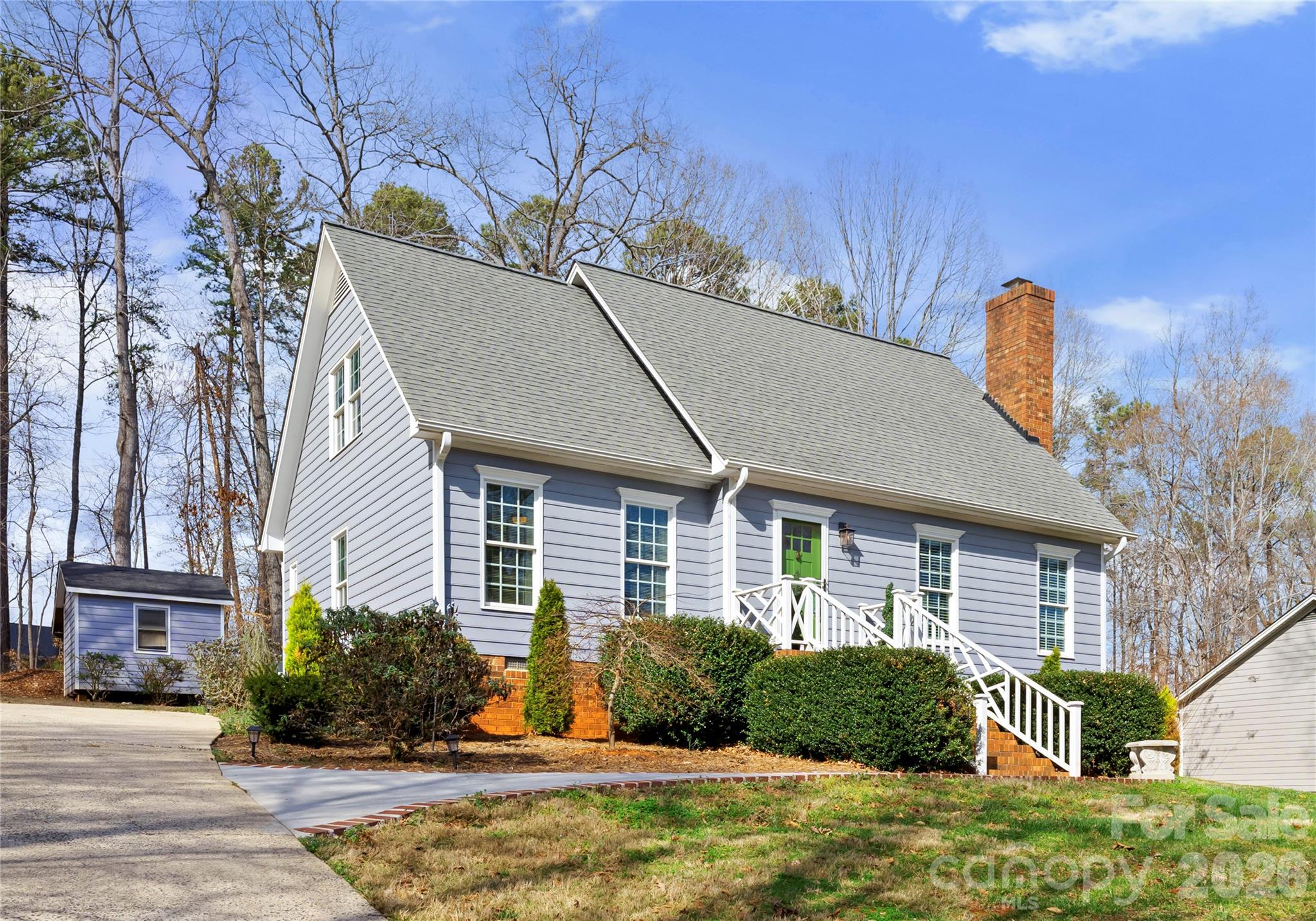 Being sold FULLY furnished! Charming Cape Cod style home nestled on half an acre lot. Step inside and see your oversized owners suite and updated custom tile shower on the main floor. This perfectly maintained 3 bed 2.5 bath home offers over 2000 sft, multiple living areas, updated bathrooms, and a home office. Features include two new HVAC units, stainless steel appliances, updated soft close cabinets, granite counter-tops, cathedral ceilings, french doors, and a real wood burning fireplace! Step outside to enjoy your large back deck and private yard. Just minutes from downtown Belmont, shopping, parks and restaurants! This is the one you've been waiting for!