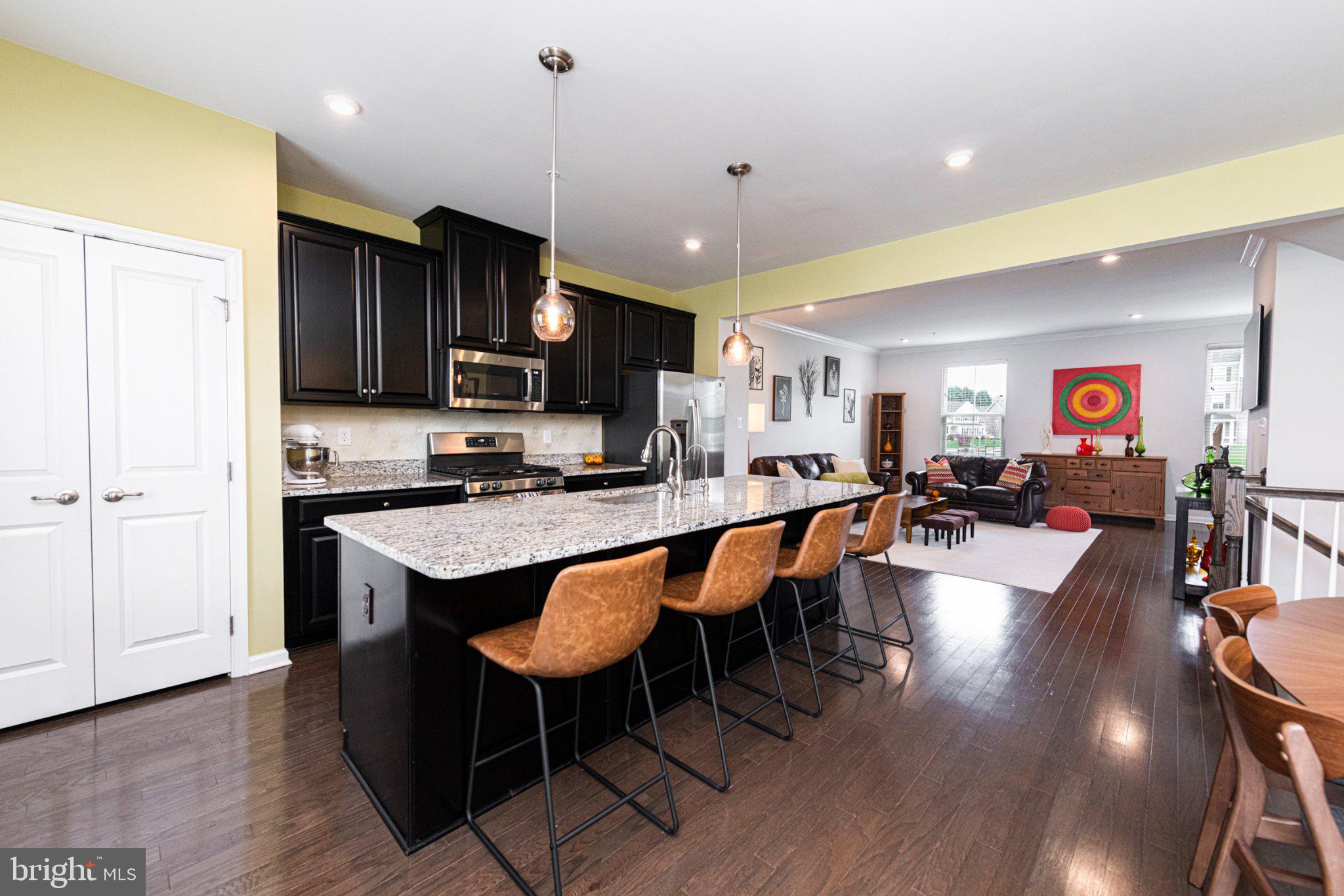 Absolutely gorgeous townhome in award winning Downingtown School District.  Part of Stargazer Village in West Bradford Township, this home has three stories of living space!!  The first level features a great bonus room that can be used as an office space or additional living room with great closet space.  Upstairs you are welcomed into a lovely kitchen with a great center island, large dining room and updated appliances.  This space is great for entertaining!  A nice sized living room and powder room finish out this level.  On the third floor you will find 3 nice sized bedrooms and two full bathrooms, you will not be disappointed with the closet space in this home.  The home is perfectly oriented to enjoy sunset on your rear deck while you unwind from your day.  Parking will not be an issue, a nice sized two car garage and an additional driveway with plenty of room.  Outside, the community offers plenty of green space with fantastic walking trails that wind through the woods.  The community itself offers a lot of great activities, ice cream socials, children's events and community gathering opportunities.  You are only 10 minutes from the Thorndale train station, Downingtown borough and access to route 30 shopping.  The HOA handles all yard maintenance and snow removal making this maintenance free living.    Come see what makes this place feel like HOME!