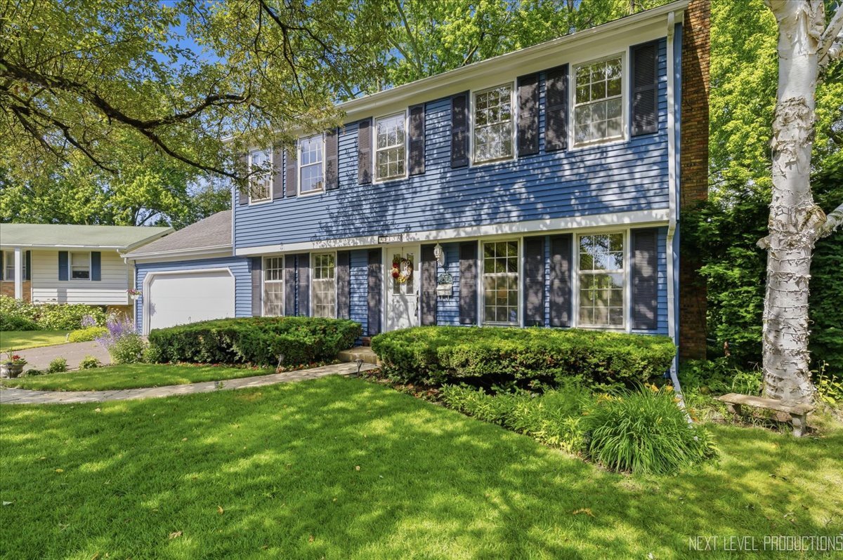 Nestled on a quiet cul-de-sac in the highly desirable Davis School neighborhood, this classic home offers an exceptional opportunity to enjoy comfort, character, and an outstanding location. Situated on a beautiful, oversized lot filled with gorgeous perennial gardens, this home is minutes from both downtown St. Charles and downtown Geneva. Special features include: Hardwood floors throughout most of the first and second levels ~ Spacious living room highlighted by a beautiful fireplace ~ Expansive family room ~ Abundant storage with several large bedroom closets ~ Kitchen offers space for casual dining and features newer stainless steel appliances. Additional updates include newer siding and gutters, plus the convenience of laundry chutes on both the first and second floors. Spend your summer relaxing on the screened porch overlooking the large, private backyard-an ideal setting for entertaining, gardening, or simply enjoying the peaceful surroundings. A wonderful place to call home in one of the area's most sought-after neighborhoods.