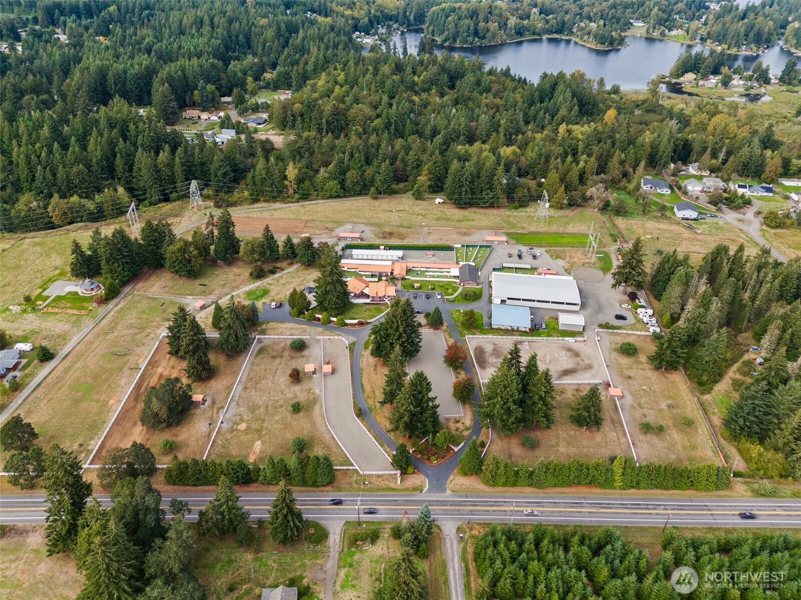 Welcome to Northwind Pet Center, a premier 15.29+/-acre equestrian & pet care estate. This property features a 150x200 outdoor arena w/hunter/jumper course, dressage arena, indoor arena (80x150) w/sand & rubber footing, vapor lighting, & sprinkler system. The stable includes heated tack rooms, wash racks, & rubber paver aisles. Over 160 kennels w/outdoor play areas. The custom-built contemporary home offers vaulted ceilings, a great room w/brick fireplace & a media room w/access to 16x40 heated pool w/privacy fencing. With over 30 years of exceptional pet & equine care, Northwind Pet Center is a rare find for animal lovers & equestrians alike. Business and property package. Please see photo descriptions.
