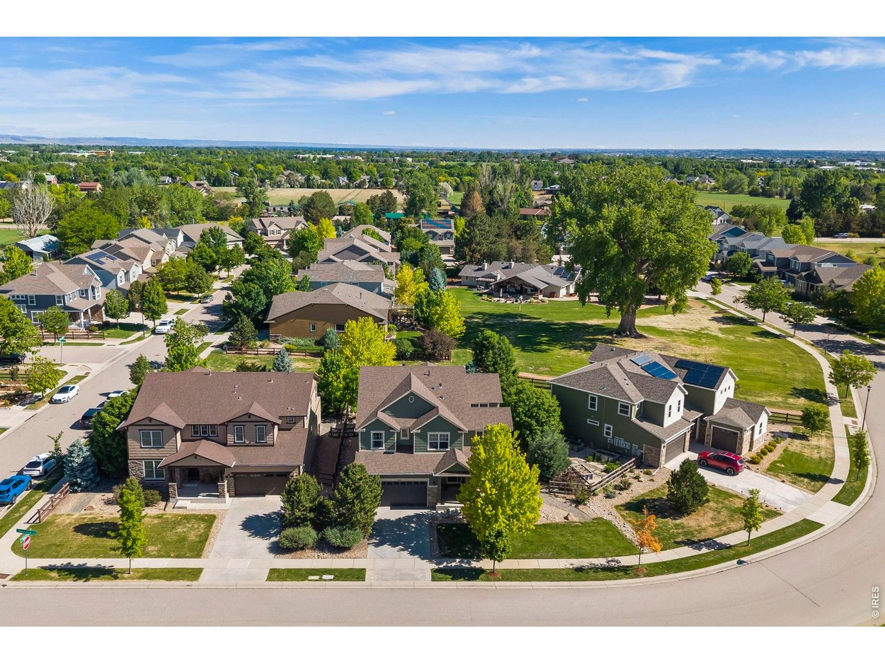 One of this home's most desirable features is its exceptional open-space setting. With open space behind the home and across the street, you'll enjoy an expansive feel and beautiful natural surroundings. Mature trees, seasonal foothill and Horsetooth views, frequent visits from hawks and songbirds, a tranquil bubbling water feature, multiple outdoor seating areas, and a fire pit create the perfect outdoor retreat for relaxing or entertaining year-round.Better than new and loaded with designer upgrades, this stunning 4-bedroom, 3-bath home in highly desirable Kechter Crossing offers the perfect blend of luxury, comfort, and functionality...