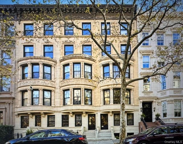 Renovation opportunity in a historic Upper West Side setting. This exceptional five-story single-family townhouse, originally constructed in 1897 in the Renaissance Revival style, offers a rare chance to restore a remarkable piece of New York City architectural history. Situated within the Central Park West Historic District, the approximately 17-foot-wide residence features 5,127 square feet of interior living space, plus an additional 1,077 square feet in the cellar and approximately 547 square feet of private outdoor space. There is also additional development potential with air rights that could allow for the creation of a rooftop bulkhead.The impressive parlour level features soaring ceilings of approximately 11 feet 4 inches and preserves an extensive collection of historic details. Original architectural elements include intricate woodwork, fireplaces, pocket doors, stained-glass features, bay windows, a gracious formal staircase, and a butler's pantry. The parlour also showcases a distinctive hand-painted ceiling dating to the turn of the 20th century. On the lower three levels, a 14-foot by 9-foot-6-inch extension provides additional interior space overlooking the spacious, south-facing private garden.32 West 85th Street is part of a trio of townhouses constructed in 1897 and designed by prominent New York architect George Frederick Pelham for developers Peter Wagner and Robert Wallace. The developers combined two 25-foot-wide lots to create three substantial residences.Pelham was an influential and highly productive New York architect whose career spanned from the 1890s through the years leading up to the Great Depression. He became particularly recognized for his townhouse designs during the final years of New York's townhouse-building era before transitioning to the apartment buildings that would become a defining feature of the Upper West Side. This residence represents one of his later townhouse commissions and retains many of the architectural characteristics associated with his work.The property enjoys an especially desirable location, just a short walk from Central Park and the Jacqueline Kennedy Onassis Reservoir. The neighborhood provides convenient access to a wide range of restaurants, shops, cultural attractions, and entertainment throughout the Upper West Side. Public transportation is also readily accessible, including the crosstown bus along 86th Street and nearby B/C and 1 subway lines.The property also benefits from unusually low property taxes. The lot measures approximately 17 feet by 102.17 feet, while the main building footprint is approximately 17 feet by 55 feet.