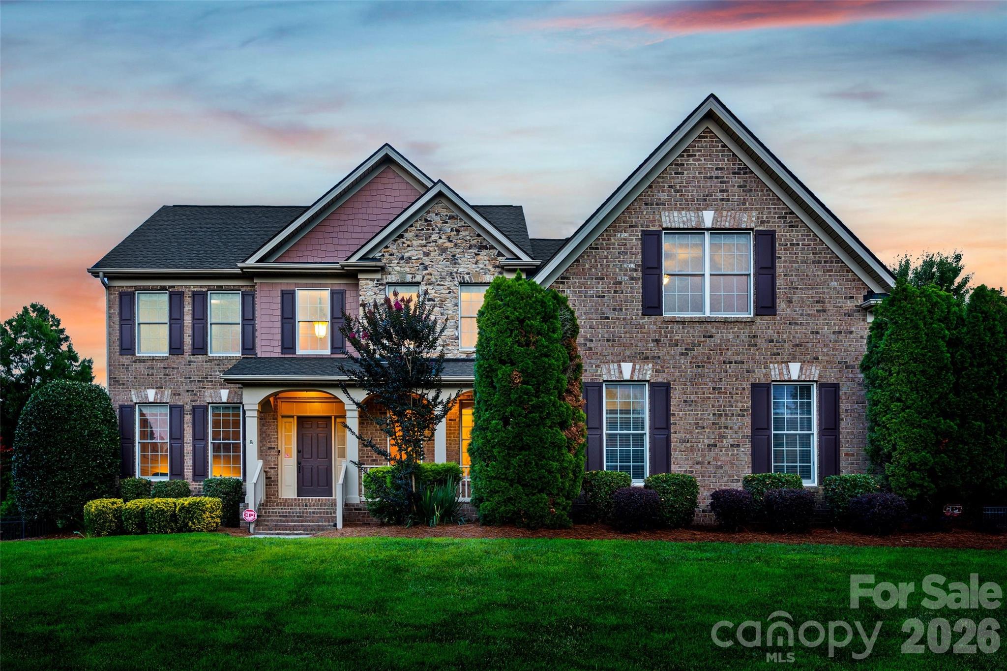 NEW PRICE! Secure your place in the highly sought-after Marvin Creek, zoned for top-rated Marvin schools. Nestled in a quiet cul-de-sac, this beautifully maintained, move-in-ready home is a short walk to the elementary school.The main floor features a 2-story foyer, formal living and dining rooms, an office with built-ins, and a half bath. A spacious family room with a cozy fireplace flows seamlessly into the breakfast area and kitchen, complete with dual walk-in pantries and a laundry room with a sink and cabinetry. A 3-season sunroom opens to a flat, fenced yard and a brand-new paver patio (2026) equipped for evening entertaining with string lights and 5000-lumen motion-sensor lighting.Upstairs, the expansive primary suite is a retreat with a sitting area, custom closets, and a bath featuring updated dual vanities with marble countertops, a soaking tub, and a walk-in shower. The second level hosts a large bonus room with built-ins, an en-suite guest bedroom, and two additional bedrooms sharing an updated dual-sink full bath.The third-floor sanctuary is an entertainer's dream, featuring space for a second private office or billiards, alongside a dedicated home theater enclave with surround sound and a walk-in closet for storage.Additional highlights include a full-house surround sound system with a receiver, a 3-car garage with additional golf cart space and overhead storage and a private irrigation well ($0 for watering the lush lawn). 2024 updates: fresh neutral paint, custom blinds in all rooms, and new carpet with upgraded padding. Enjoy Marvin Creek's incredible resort-style amenities: multiple pools, a lazy river, waterslides, a clubhouse, sports courts, a fitness center, and trails.