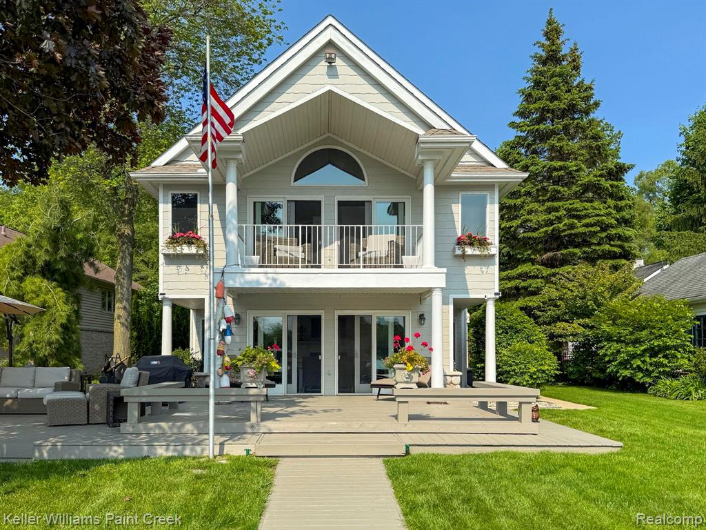Welcome to the jewel of Green Lake.  This property boasts of 65' of frontage uniquely positioned for serene sunset pontoon cruises on an ELECTRIC MOTOR LAKE ONLY!  This 2-story colonial does not spare any expense. The beautifully exquisite entry foyer that opens to white marble kitchen complete w/stacked stone backsplash, Shaw's farmhouse sink, 6-burner Wolf gas cooktop, hood fan, kitchen-aid double oven, GE fridge, whirlpool dishwasher & beverage refrigerator. Kitchen opens to an immense great room that overlooks the lake with a natural fireplace perfect for cozy evenings. Natural light abounds throughout the home.  Great room has side-by-side Anderson doorwalls that open to the deck offers ease for entertaining from the great room. Hardwood flooring & recently painted neutral color throughout the home. 1st floor study/library room can also be converted to guest suite w/private en-suite.  Primary 2nd floor BR with expansive size and breathtaking views o the lake.  Add'l BR's on 2nd floor that have additional amenities such as a loft for one (kids will love this one) and balcony for the other.   2nd floor bonus room can be used for add'l primary, family, exercise room or office area.  Plus another fully recently remodeled tiled flooring bathroom.  Plenty of storage for vehicles with add'l storage in the oversized epoxy flooring garage with room for workshop.  Extra-wide concrete driveway.  Roof recently treated by RoofMax - 5 yr life extension.  All new window screens for entire home and central vac system. The real STAR of the show is the backyard with large lakeside deck, arborvitae-lined for privacy, built-in benches and stone firepit, L-shaped deck & the rock seawall completes the ideal setting for dinner parties and many festive gatherings WITH BEAUTIFUL WESTERN SUNSETS! The Green Lake Association has year-round activities w/4th of July fireworks as one of the highlights within this tight-knit lake community.  Hurry before this beautiful lake front home is gone