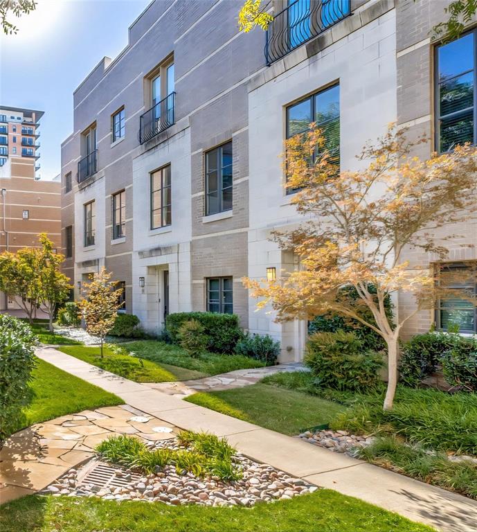 Nestled in the heart of Uptown just steps away from the Katy Trail, this exquisite brownstone-inspired home offers a perfect blend of charm & modern luxury. Two brand-new Carrier HVAC systems installed May 15, 2026—comes with a 2-year labor warranty & 10-year parts warranty for buyer. New tankless water heater installed for efficiency and long-term savings, plus complete replacement of Juliet balcony doors & windows, and a fully updated garage system. Seller including a home warranty. Built 2006, the 2Bedroom 3Bath home includes a bonus room, ideal for home office. Has 3-stories with private rooftop deck & gives you true breathing room with over 2300 SqFt with soaring 11-Foot-high ceilings. Rich chocolate cabinetry & quartz—granite countertops throughout set the tone for elevated living. The open-concept features hardwood floors & a seamless flow between the kitchen, dining & living area, perfect for entertaining. Kitchen is a showstopper with oversized cabinets, large island, stainless steel appliances & walk-in pantry. Living area includes built-in entertainment nook, wine bar & wine refrigerator, adding a touch of luxury to your everyday. Primary suite has Juliet balcony, sitting area, spa-inspired bathroom with dual undermount sinks, oversized mirror, jacuzzi tub, separate glass shower, water closet & walk-in closet. Full-sized washer & dryer located on same floor. Second bdrm has full bath, ideal for guests. 4th floor rooftop deck invites you to enjoy sunsets, starlit evenings & unforgettable gatherings with room to mount a flat-screen TV, hang string lights—it’s your personal open-air lounge. Additional highlights; attached 2-car garage, access to resort-style pool with waterfall—all tucked into a quiet residential enclave yet surrounded by the energy, elegance & connection that only Uptown can offer. Prime location with trolley close by providing car-free access to everything the area offers. You’re not just purchasing a property, you’re claiming a lifestyle.