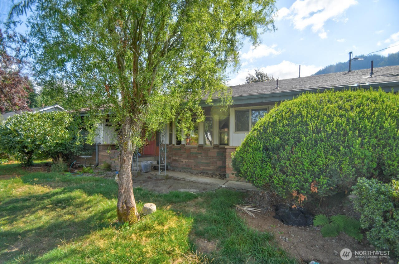 Located in the center of Morton. This home is in walking distance to local amenities such as the hospital, grocery stores, recreational activities,  restaurants, and so much more! 1519 sf home on .33 acres with 3 large bedrooms and 1.5 baths.  2 car garage with carport for plenty of covered parking.  Home is fully fenced on spacious corner lot with large front and back yards. Home features a double sided fireplace and heat pump which keeps the home cozy year round.