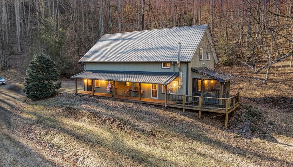 Nestled on over 20 acres in the mountains of Murphy, NC, this exceptional 2 bed, 2 bath property at 620 Hidden Hills Estates Dr offers a rare blend of space, privacy, and future potential. Enjoy a large, open yard with room to bring any vision to life—gardens, recreation, additional structures, or simply wide-open mountain living.  The home features central heating and air installed in 2021, providing modern comfort and efficiency. One of the property's most unique highlights is that you own all the way to the very top of the mountain, offering the opportunity to live in the existing home now and build your dream home higher up to maximize long-range mountain views and even greater privacy.  The property is well-equipped for both work and connectivity, featuring Starlink Internet but Blue Ridge EMC fiber optic internet is available, also a large workshop, ideal for hobbies, storage, or equipment. With underground utilities already in place above the home, the land is well-prepared for future construction, making it an ideal setup for expansion.  Whether you're seeking a full-time residence, mountain getaway, investment property, or future estate, this property provides flexibility and endless possibilities—all while already offering excellent privacy and natural beauty.  Opportunities like this are rare. Come explore the potential and make this mountain retreat your own. The mountains are calling—are you listening? PS. Horses are permitted!