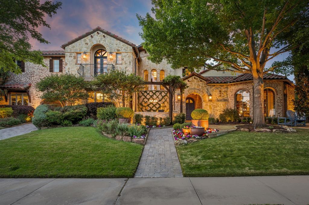 Experience the most stunning Spanish Revival estate in North Dallas.Situated within the exclusive, guard-gated community of Enchanted Hill. This abode sits on one of the finest lots, featuring a dream backyard & breathtaking view of an English garden, surrounded by mature trees & arboretum-like landscaping.Magnificent courtyard. Inside, the decor is bold, classy & beautiful, with an interesting floor plan that captivates at every turn. You'll be mesmerized by the lavish chandeliers, opulent wall coverings, designer paint colors & exquisite artwork throughout.Six-bedroom suites, 2 half baths, office, game, media, pool, spa & 3 garages. Impressive foyer with sweeping staircase, elegant dining room, exceptional family room with an FTC stone fireplace & panoramic view of the pool. The family room flows gracefully to the kitchen, breakfast area & an additional lounging space with another fireplace. Chef’s kitchen features Wolf-Subzero appliances, handmade gold leaf backsplashes, island, breakfast bar, multiple beverage & wine coolers, a bar & a wine cellar. Upstairs, 3-bedroom suites, a game room & an impressive home theater.The exquisite master suite serves as a luxurious retreat, complete with a large sitting area, a spa-like bathroom & a fabulous closet. Each bedroom has a luxurious bathroom with marble countertops, decorative wallpapers & large showers.There's a gym, large laundry room, mudroom, 2 fireplaces, 2 staircases, Iron French doors & a mosquito control system. The magazine-worthy backyard is a highlight of this home, featuring an incredible pool, spa, expansive paver decking, multi lounges, a large pergola with a built-in grill & an al fresco dining setting, firepit area, sunset deck, green turf & arbor swing.Exceptional architectural lighting, lush landscaping, mature trees & sculptures, this estate offers abundant spaces for ultimate privacy or hosting luxurious events. Enjoy a chic, timeless, and sophisticated lifestyle unmatched in the area.