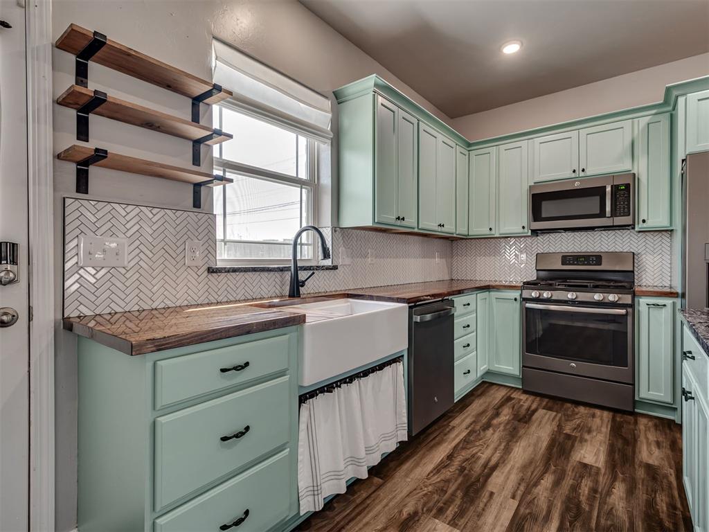 Built in 2016 and thoughtfully upgraded, this stylish home sits on a spacious &#188;-acre lot in the desirable Southmoore School District. You’ll love the open-concept layout that connects the living area and kitchen—perfect for entertaining or keeping everyone connected. The kitchen features custom-painted cabinetry, a large center island, and butcher block countertops that add warmth and character. Both bathrooms have been remodeled, including a gorgeous walk-in shower in the primary suite. Step outside to enjoy the stamped-concrete patio overlooking your fully fenced backyard—ideal for pets, gatherings, or weekend projects. An oversized 2-car garage (added in 2019) gives you extra space for tools, hobbies, or storage, and the full guttering helps keep everything low-maintenance year-round. This home blends modern style with practical upgrades in one of Moore’s most convenient locations—just minutes from schools, parks, and shopping.