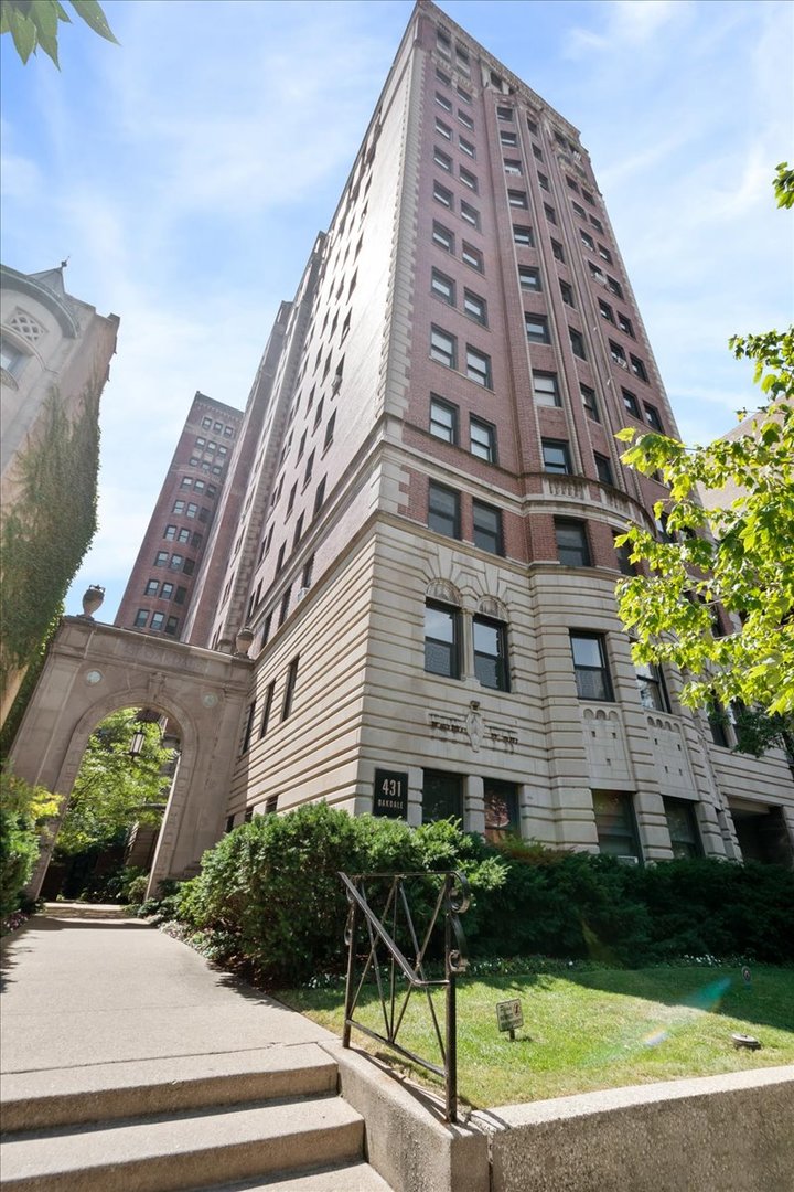 Discover timeless sophistication in this elegant large 2-bedroom, 2-bath condominium-Unit 10D-perched on the 10th floor of the distinguished Oakdale Towers at 431 W Oakdale Avenue in vibrant Lakeview East. Designed by noted architects E.F. Quinn & R.T. Christiansen, this building has two elevators serving the floor-the main elevator opening directly to your home and another elevator off the kitchen. Freshly painted interiors and beautifully refinished hardwood floors set a serene, sophisticated tone from the moment you enter the massive gallery-style foyer with its accent-lit barrel ceiling which leads to an expansive formal dining room with high ceilings and panoramic views as it flows into the sleek chef's kitchen with white cabinetry, stone counters, and high-end stainless-steel appliances. Turn left and discover the grand living room area that offers a lovely lake view and refined space ready for both entertaining and relaxation. The bedroom wing includes two generous retreats, each with skyline views; the primary suite boasts built-in shelving, a renovated ensuite bath, and ample closet space, while the second bedroom enjoys access to a modernized full bath. SpacePak A/C ensures year-round comfort, and abundant in-unit storage is complemented by a cedar lined coat closet, and there is also an additional dedicated storage unit in the basement. Building amenities include a well-equipped fitness center and a spectacular rooftop deck, perfect for watching the sun rise over Lake Michigan and set over the city. This spectacular location close to the lakefront, and bustling Broadway Street provides world class shopping, dining, entertainment, and transportation options. This classic residence offers a rare blend of historical elegance, contemporary comfort, and Chicago charm.