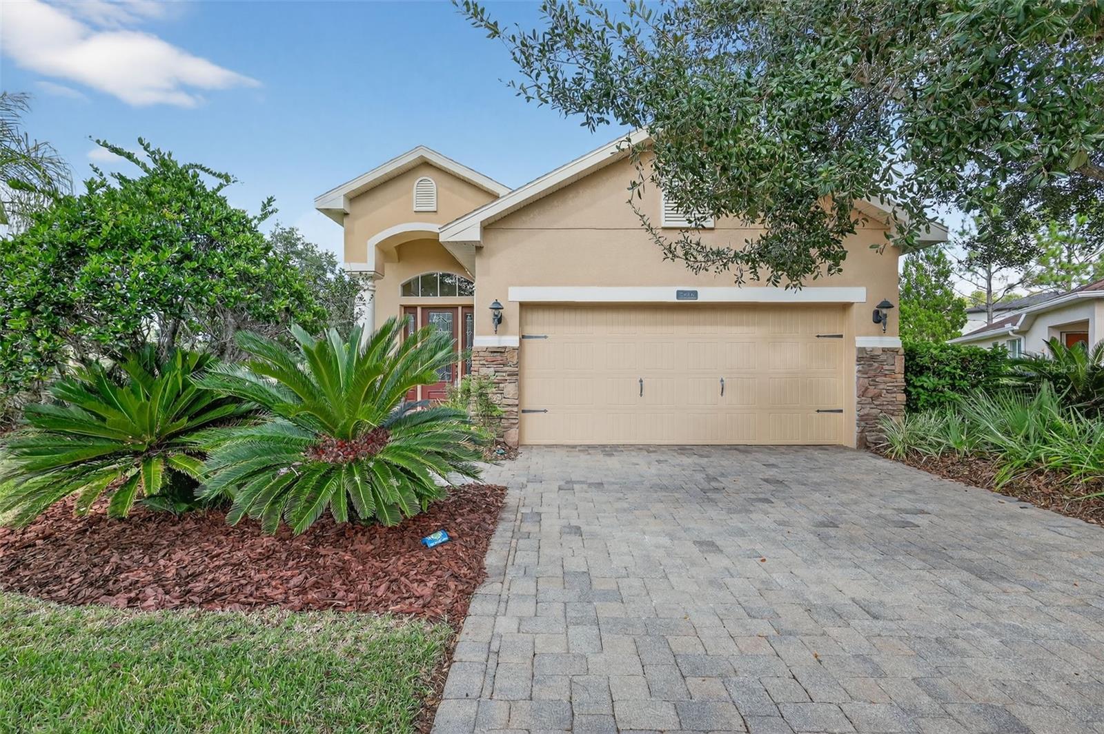 Under contract-accepting backup offers. Located in the gated Tuscany neighborhood of Tampa Palms, this one-owner home is perfectly positioned on a quiet cul-de-sac with serene pond views. Offering well-maintained, single-story living in a premier location, the property is just minutes from USF, Moffitt Cancer Center, hospitals, highly rated schools, the YMCA, a variety of restaurants, shopping, and has easy access to I-75.

The open and functional floor plan features a formal dining room, an eat-in kitchen with granite countertops, abundant solid wood cabinetry, and a family room with sliding doors that open to the screened and covered lanai—perfect for relaxing outdoors while enjoying the peaceful view and spotting wildlife. The master suite offers comfort and privacy with double walk-in closets and a bathroom that includes a double vanity, soaking tub, and separate shower.

Additional features include a full house filtration, water softener, and five-year-old A/C system upgraded for enhanced efficiency and comfort. With an HOA fee of just $175 per month covering lawn care, this home combines convenience and value in one of New Tampa’s most desirable communities.  Furniture is negotiable.