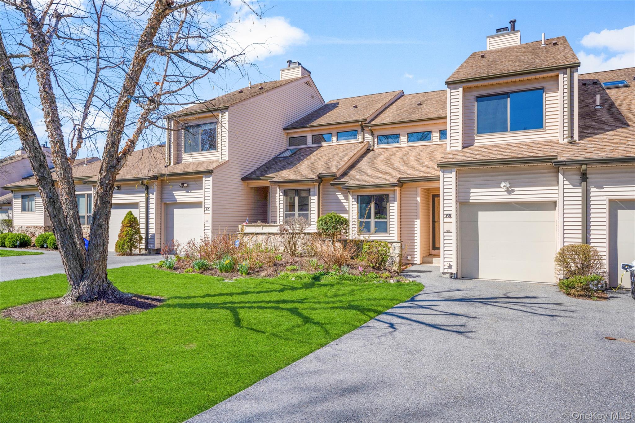 Welcome to 78 Hudson Watch Drive, a stunning 2-bedroom, 3.5-bath tri-level townhouse offering an unparalleled luxury lifestyle.  Experience breathtaking Hudson River views spanning all three floors of this meticulously maintained home.Step inside to a truly inviting space featuring a spacious sunken living room anchored by a cozy gas fireplace. The layout is wonderful for entertaining, leading into a dining room with a door that opens directly to a quiet deck—for al fresco dining with a view. The eat-in kitchen is the heart of the home with stainless steel appliances and granite counters.  The first floor also includes an office and a powder room.The upper level features a primary suite complete with an ensuite bath with a steam shower, spa tub, and a large walk-in closet. Step out to your balcony and enjoy the mountains and river view.  There is a lovely second bedroom,  hall bath  and a dedicated laundry area which complete this floor. The lower level has ample space for endless possibilities.  It features a large family room with a kitchenette, a full bath and sliding glass doors to a covered patio. Enjoy year-round comfort with central air conditioning throughout the home.The community offers an in-ground pool and tennis court as well as lawn maintenance for the approximately 80 homes in Hudson Watch.