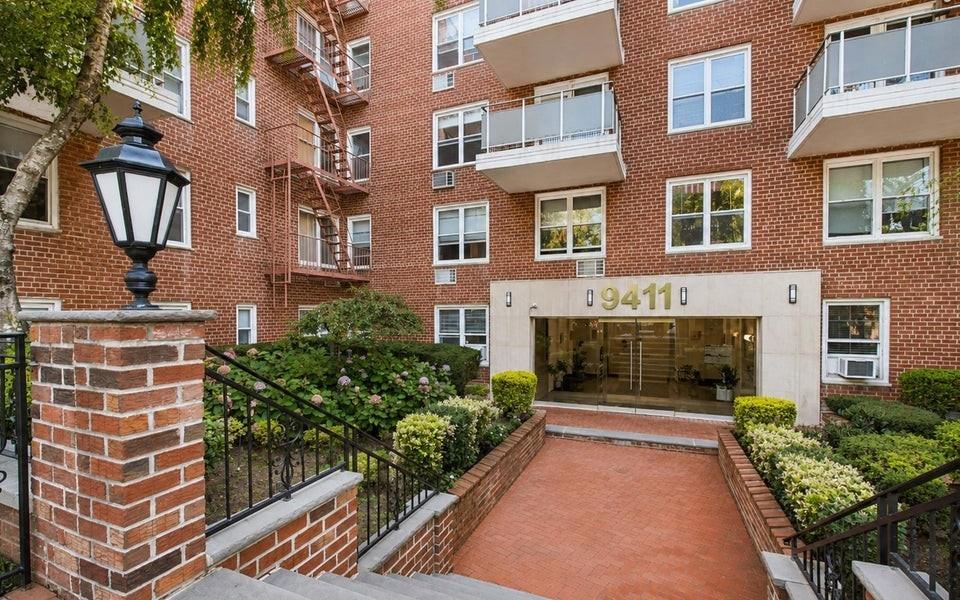 Tucked away in a premier Shore Road building in Bay Ridge, Residence 3J is a sun-drenched, beautifully renovated Junior 4 apartment. A welcoming entry foyer features two nice-sized closets, offering excellent storage right as you arrive. From there, oversized windows with southern and eastern exposures flood the entire home with brilliant, all-day natural light, highlighting the gleaming oak hardwood floors and custom built-ins throughout. The sprawling living and dining area seamlessly connects to a thoughtfully redesigned kitchen. Perfect for home chefs, it boasts gorgeous quartz countertops, premium stainless steel appliances, a farmhouse sink, and two-tone shaker cabinetry with under-cabinet lighting. The primary bedroom serves as a private retreat, featuring an enviable custom walk-in closet plus a spacious secondary closet. Nearby, the pristine bathroom offers a deep soaking tub with an adjacent massive linen closet. Separated by frosted-glass sliding doors, the versatile second bedroom is perfectly suited for a nursery, home office, or formal dining room. This building offers the perfect balance of vibrant neighborhood living, effortless commuting, and tranquil escapes. The Manhattan X27 and X37 express buses and the local bus B16 are conveniently situated directly in front of the building, and the R subway station is just blocks away. Plus, the building is within a short distance to local restaurants and stores, and just steps away from scenic waterfront parks. Premier full-service, luxury building superbly maintained with a beautifully landscaped entrance, welcoming lobby, recently remodeled hallways and elevators, part-time doorman, and live-in superintendent and lobby level laundry room. Building amenities include parking spaces, storage units, and bike racks, all of which are subject to a waitlist. Pets are welcome (with restrictions).